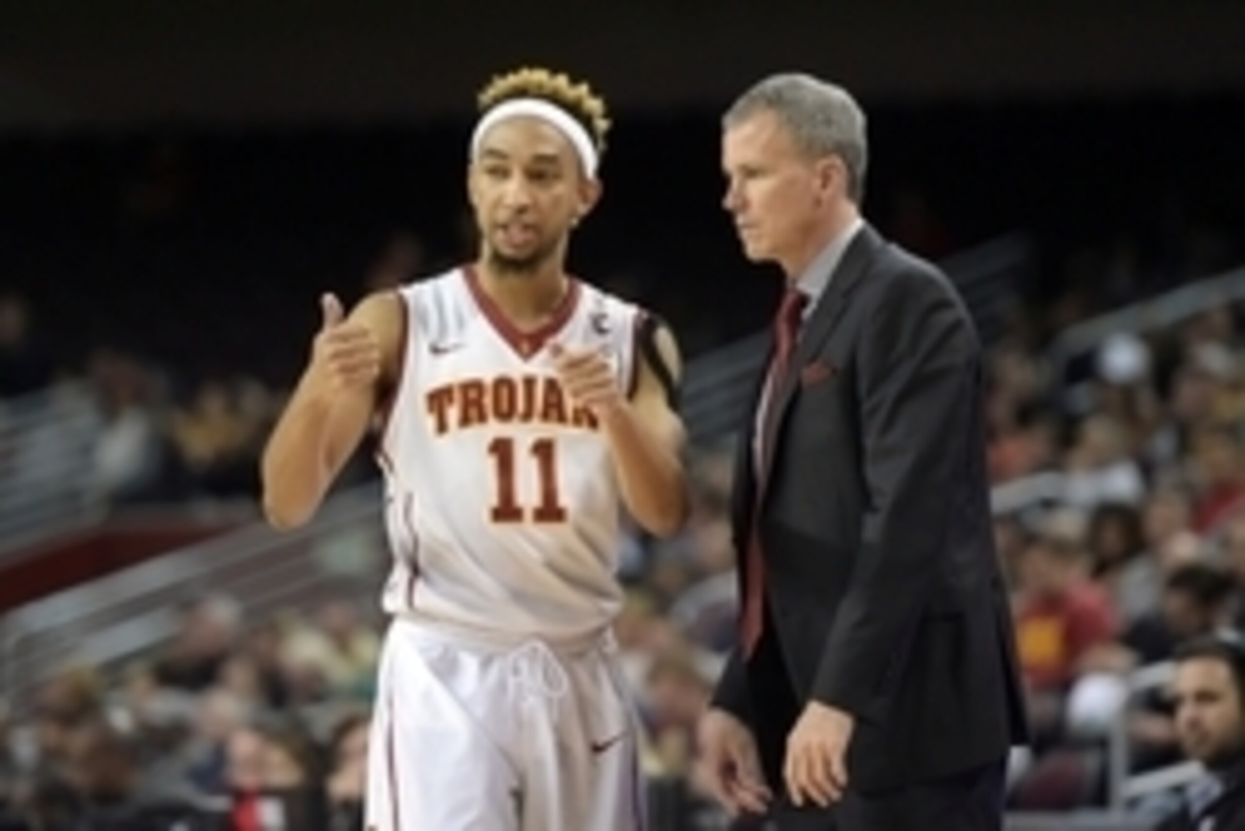 Feb 17, 2016; Los Angeles, CA, USA; Southern California Trojans coach Andy Enfield (right) and guard Jordan McLaughlin (11) during an NCAA basketball game against the Colorado Buffaloes at Galen Center. USC defeated Colorado 79-72. Mandatory Credit: Kirby