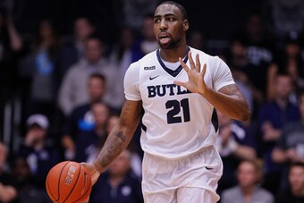 INDIANAPOLIS, IN - MARCH 5: Roosevelt Jones #21 of the Butler Bulldogs brings the ball up court during the game against the Marquette Golden Eagles at Hinkle Fieldhouse on March 5, 2016 in Indianapolis, Indiana. (Photo by Michael Hickey/Getty Images)
