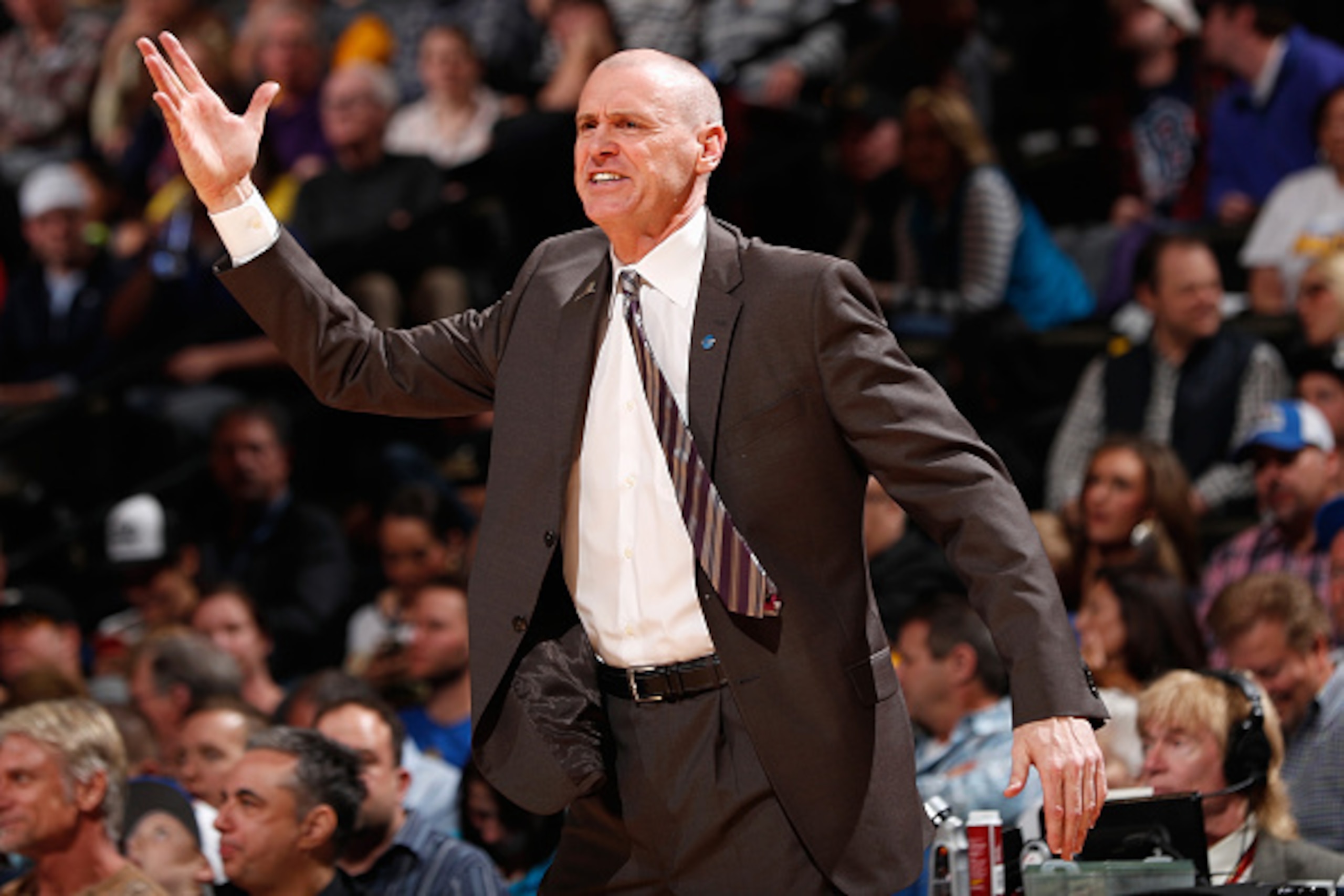DENVER, CO - MARCH 06:  Head coach Rick Carlisle of the Dallas Mavericks leads his team against the Denver Nuggets at Pepsi Center on March 6, 2016 in Denver, Colorado. The Nuggets defeated the Mavericks 116-114 in overtime. NOTE TO USER: User expressly a