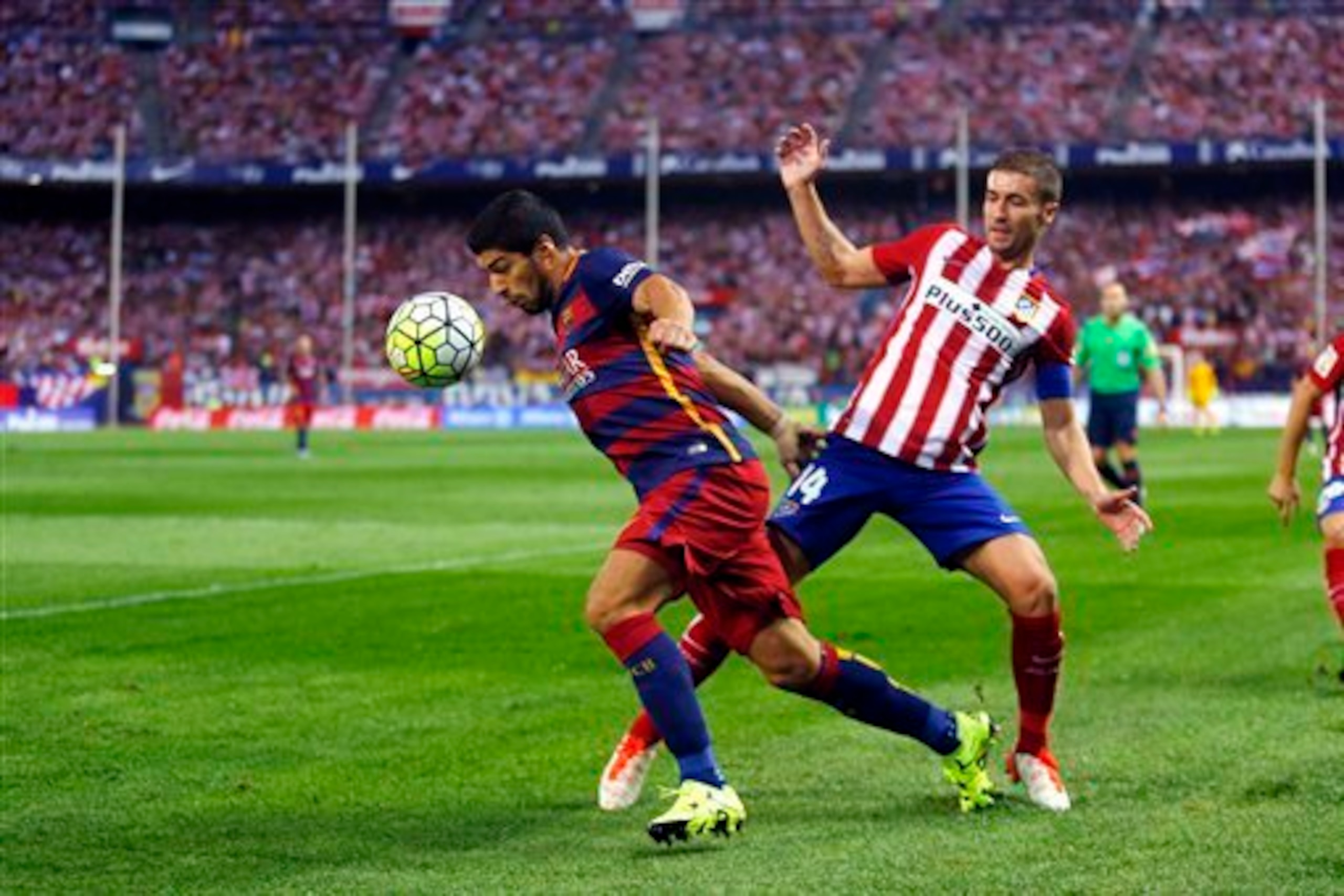 Atleti captain Gabi, here challenging Luis Suarez, launched his team's most effective attacks during the first game in the Netherlands