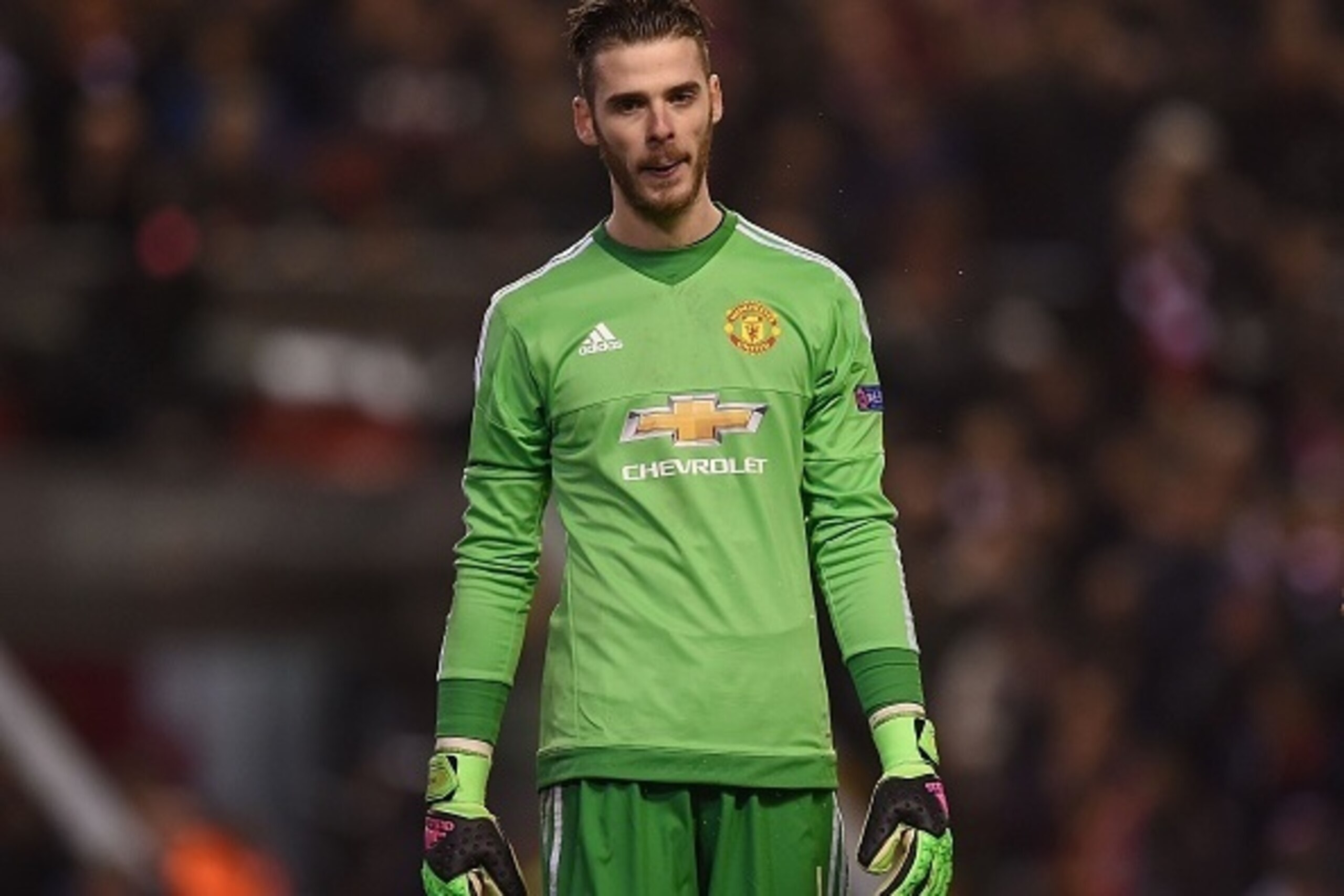 Manchester United's Spanish goalkeeper David de Gea reacts during the UEFA Europa League round of 16, first leg football match between Liverpool and Manchester United at Anfield in Liverpool, northwest England on March 10, 2016. / AFP / PAUL ELLIS        