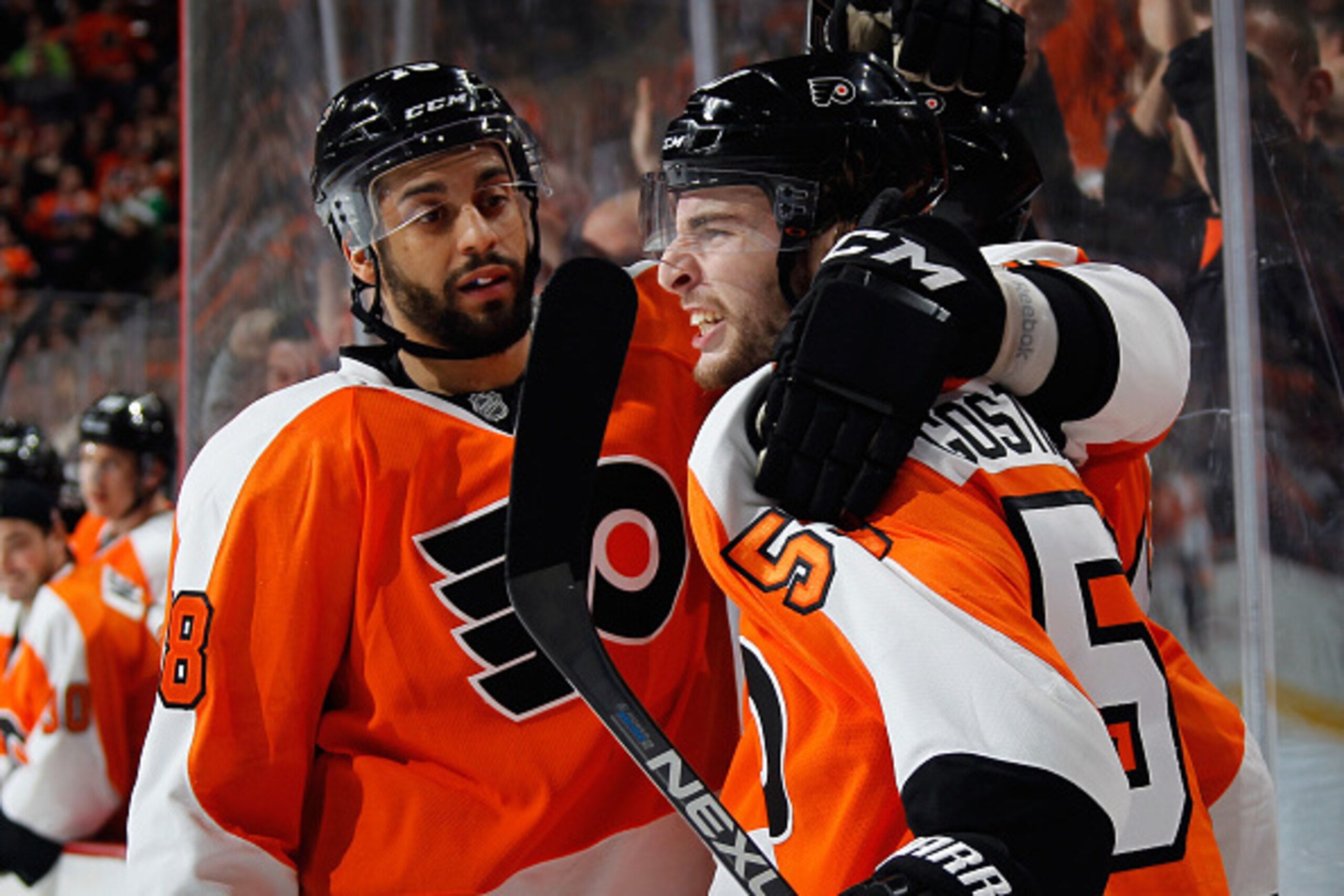 PHILADELPHIA, PA - MARCH 07:  Shayne Gostisbehere #53 of the Philadelphia Flyers (r) celebrates his goal at 16:51 of the second period against the Tampa Bay Lightning and is joined by Pierre-Edouard Bellemare #78 (l) at the Wells Fargo Center on March 7, 