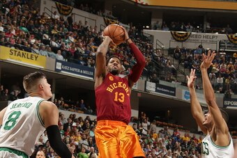 INDIANAPOLIS, IN - MARCH 15:  Paul George #13 of the Indiana Pacers shoots against the Boston Celtics on March 15, 2016 at Bankers Life Fieldhouse in Indianapolis, Indiana. NOTE TO USER: User expressly acknowledges and agrees that, by downloading and or u