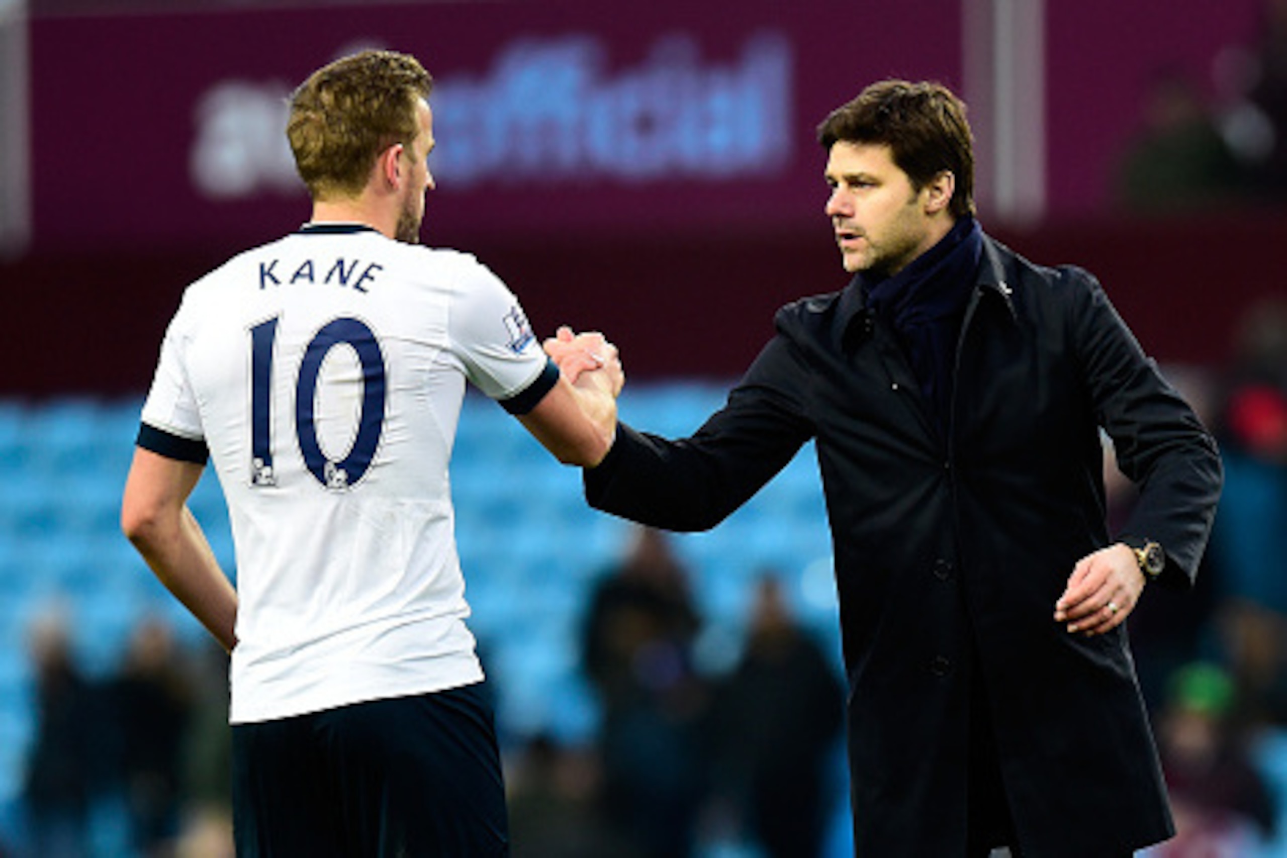 BIRMINGHAM, ENGLAND - MARCH 13:  Mauricio Pochettino manager of Tottenham Hotspur and Harry Kane of Tottenham Hotspur shake hands after victory in the Barclays Premier League match between Aston Villa and Tottenham Hotspur at Villa Park on March 13, 2016 