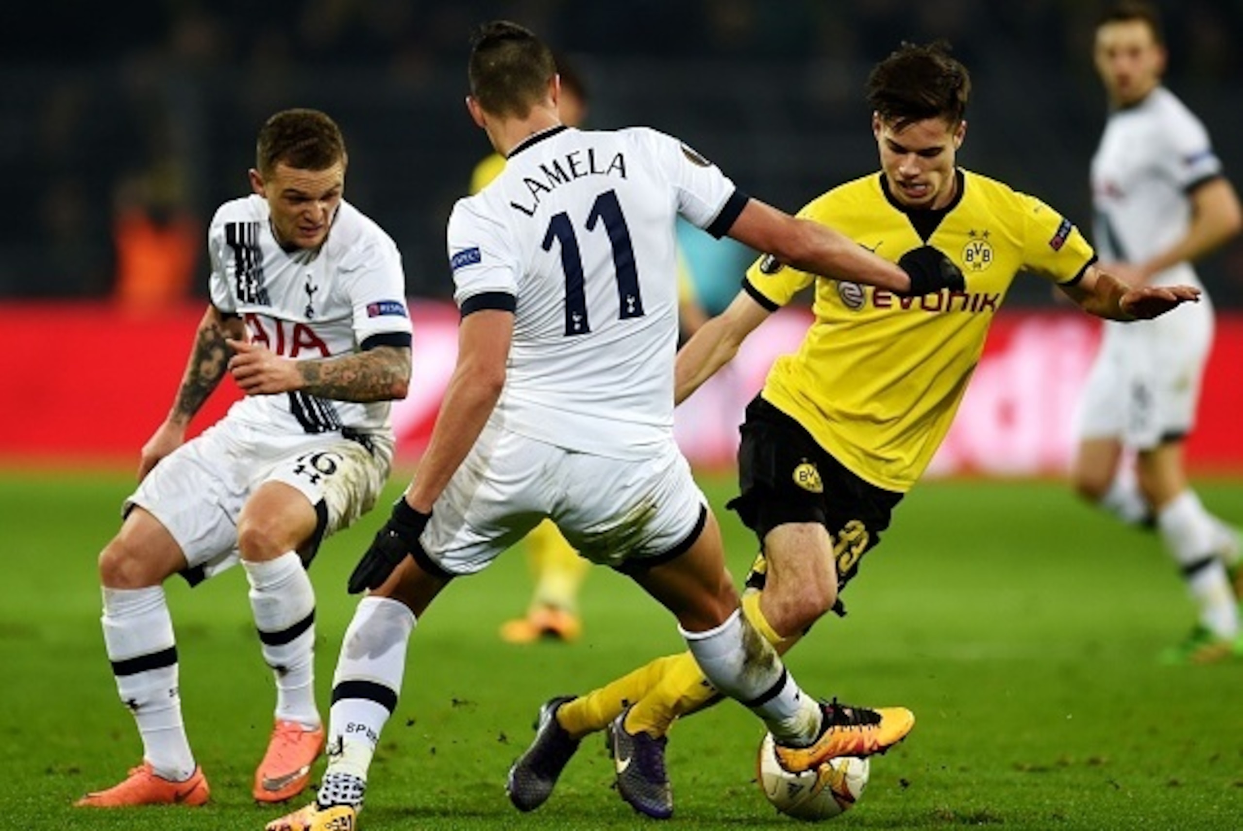 Dortmund's midfielder Julian Weigl vies with Tottenham´s Erik Lamela during the UEFA Europe League Round of 16 first leg football match between Borussia Dortmund and Tottenham Hotspurs in Dortmund, western Germany on March 10, 2016. 
Dortmund won the matc