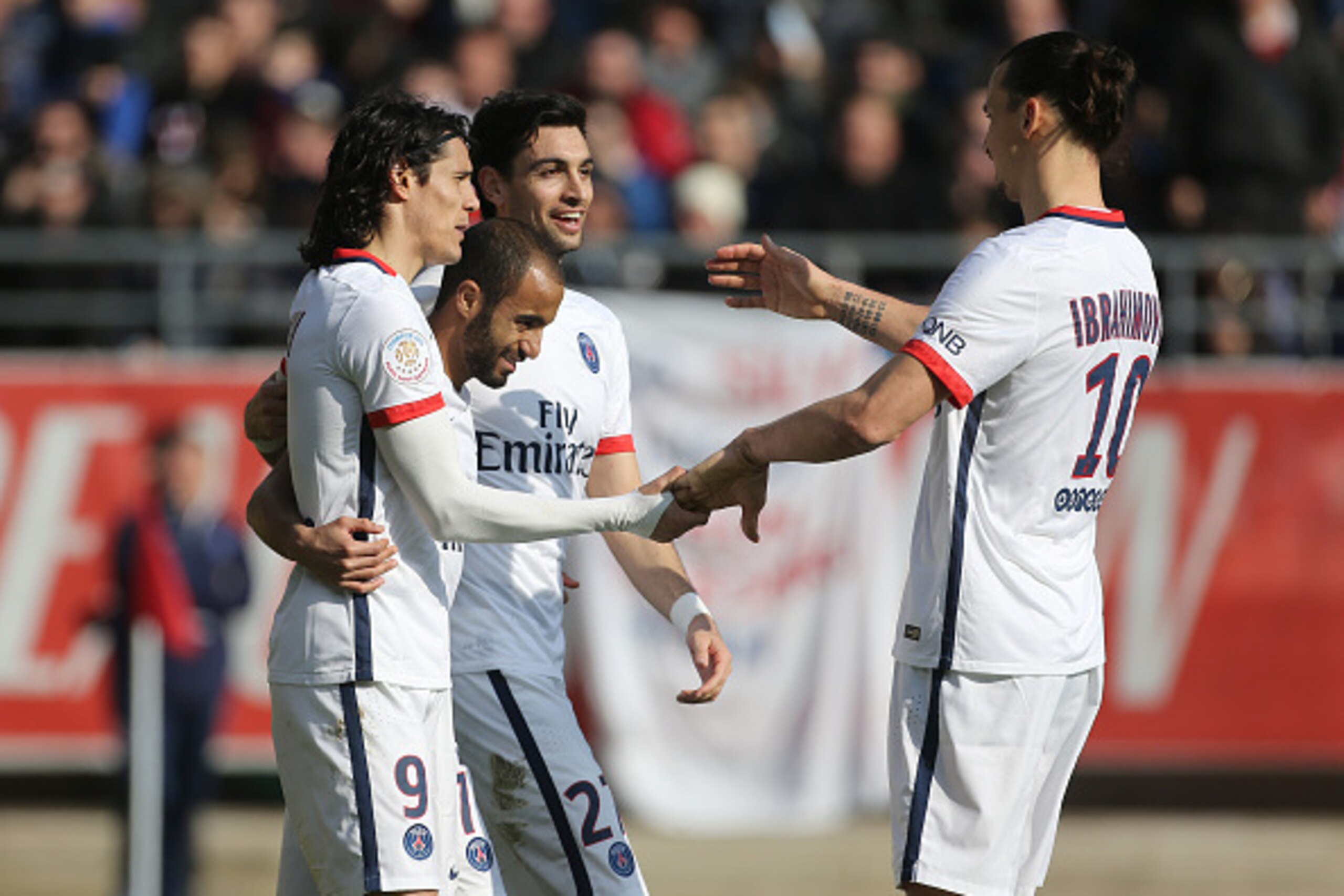 TROYES, FRANCE - MARCH 13: Edinson Cavani of PSG celebrates his second goal with Lucas Moura, Javier Pastore, Zlatan Ibrahimovic of PSG during the French Ligue 1 match between ESTAC Troyes and Paris Saint-Germain (PSG) at Stade de l'Aube on March 13, 2016