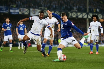 LIVERPOOL, ENGLAND - MARCH 12: Ross Barkley of Everton shoots at goal while John Mikel Obi of Chelsea tries to block during the Emirates FA Cup sixth round match between Everton and Chelsea at Goodison Park on March 12, 2016 in Liverpool, England.  (Photo