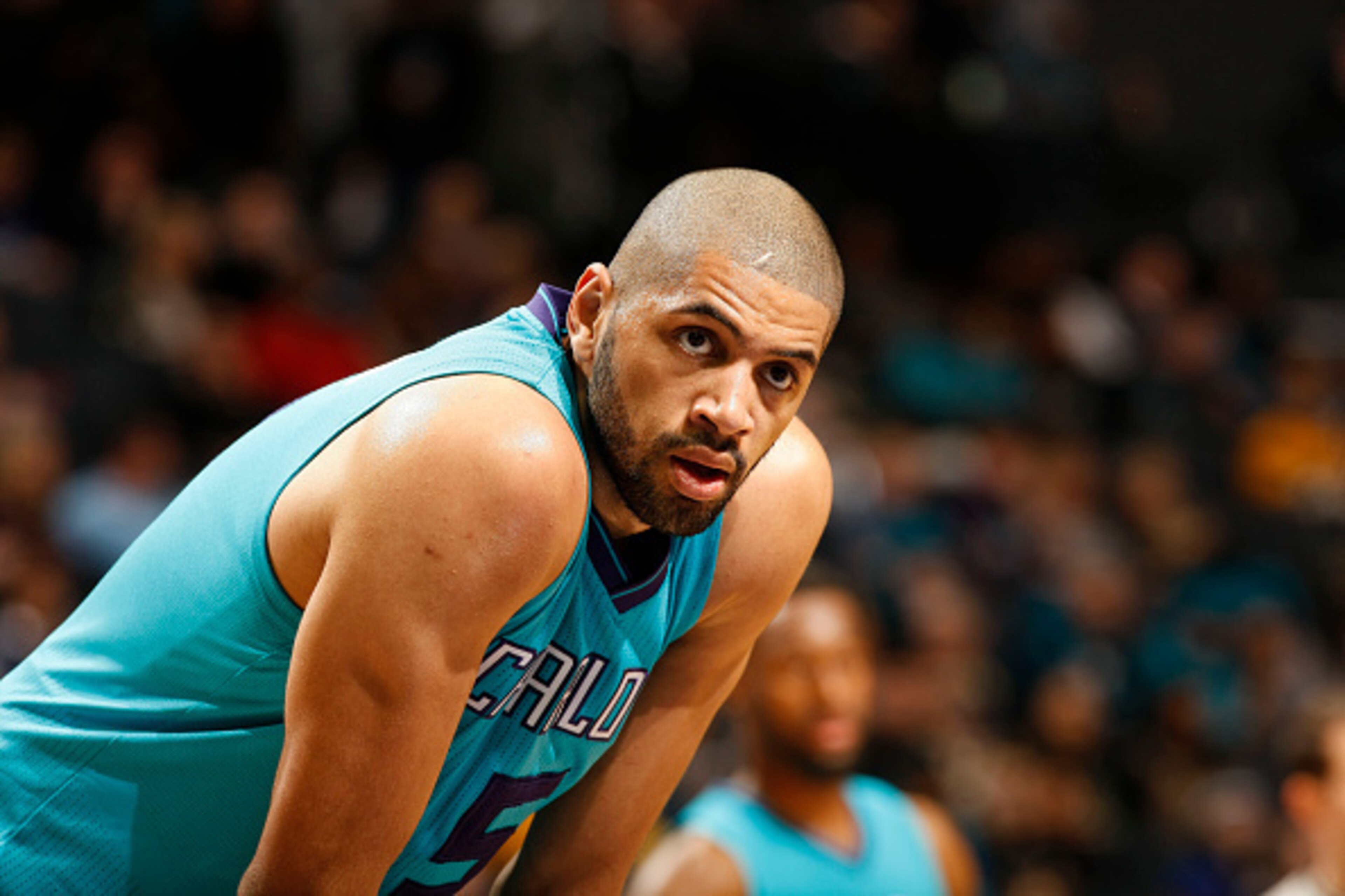 CHARLOTTE, NC - MARCH 4: Nicolas Batum #5 of the Charlotte Hornets stands on the court during the game against the Indiana Pacers on March 4, 2016 at Time Warner Cable Arena in Charlotte, North Carolina. NOTE TO USER: User expressly acknowledges and agre CHARLOTTE, NC - MARCH 4: Nicolas Batum #5 of the Charlotte Hornets stands on the court during the game against the Indiana Pacers on March 4, 2016 at Time Warner Cable Arena in Charlotte, North Carolina. NOTE TO USER: User expressly acknowledges and agre