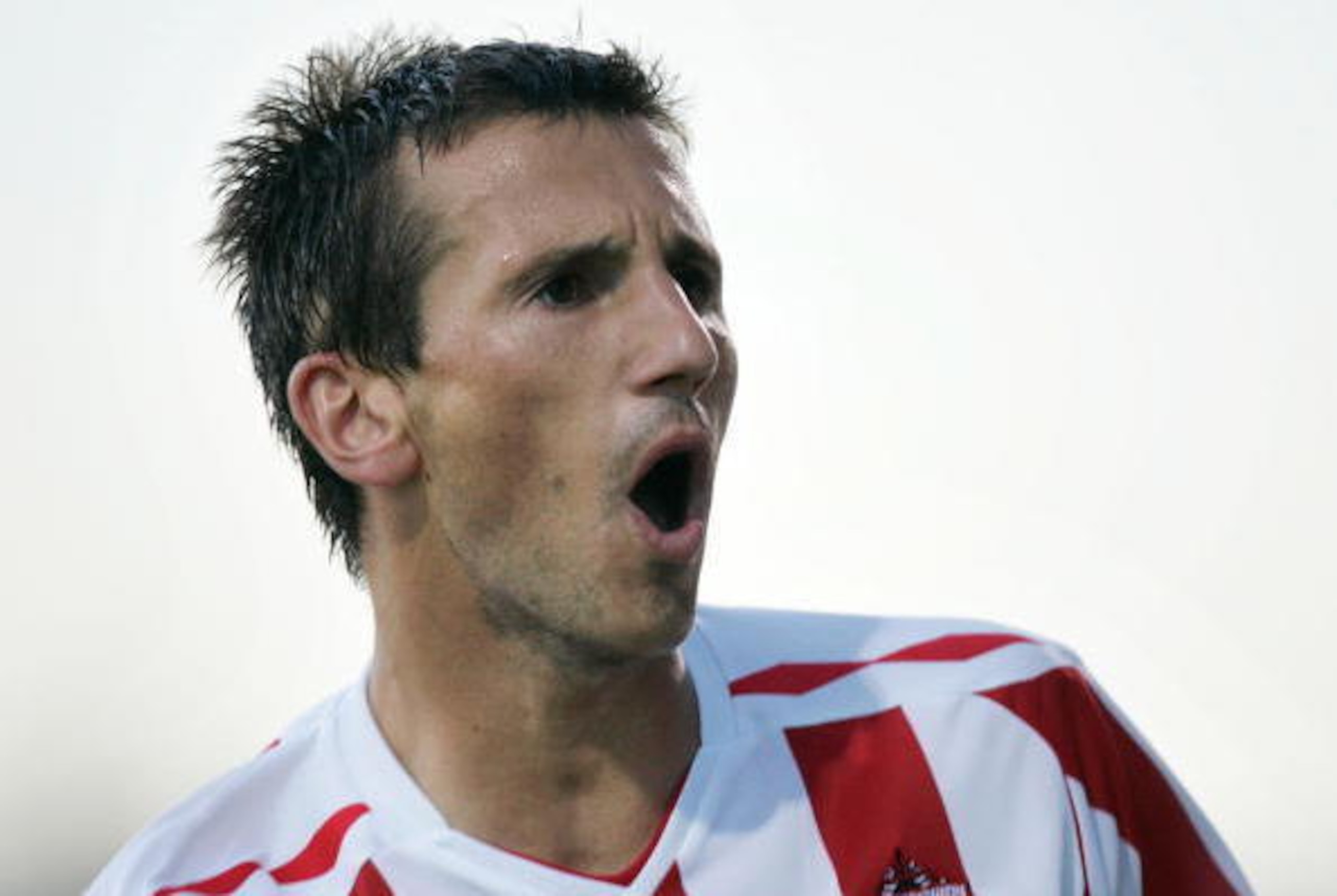 CORK, IRELAND - JULY 30:   Liam Miller of Sunderland celebrates scoring the equalising goal during the Pre-Season friendly match between Cork City and Sunderland at Turners Cross on July 30, 2007 in Cork, Ireland. (Photo by Patrick Bolger/Getty Images)