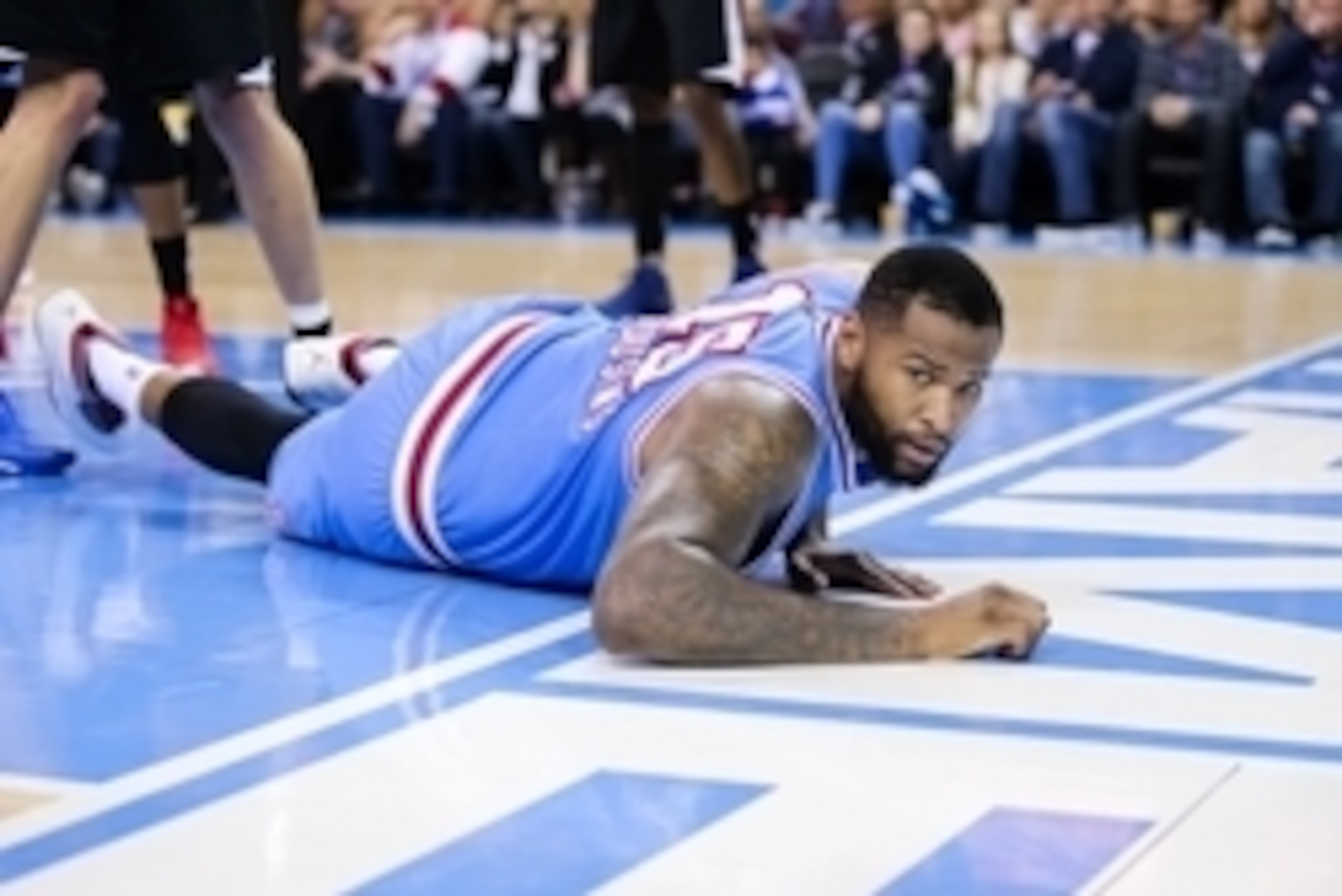 Feb 26, 2016; Sacramento, CA, USA; Sacramento Kings center DeMarcus Cousins (15) falls on the court against the Los Angeles Clippers during the fourth quarter at Sleep Train Arena. The Clippers won 117-107. Mandatory Credit: Kelley L Cox-USA TODAY Sports Feb 26, 2016; Sacramento, CA, USA; Sacramento Kings center DeMarcus Cousins (15) falls on the court against the Los Angeles Clippers during the fourth quarter at Sleep Train Arena. The Clippers won 117-107. Mandatory Credit: Kelley L Cox-USA TODAY Sports