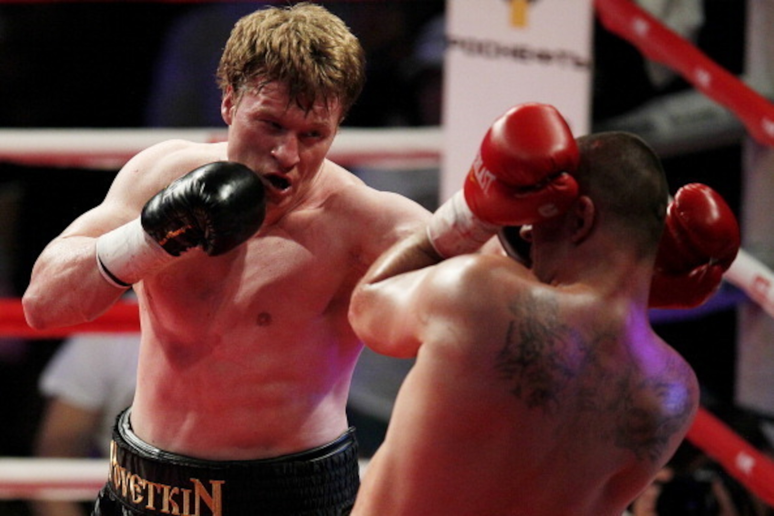 MOSCOW, RUSSIA - MAY 17: Alexander Povetkin (L) of Russia fights with Andrzej Wawrzik of Poland during their WBA heavyweight title bout at the Crocus City Hall on May 17, 2013 in Moscow, Russia.  (Photo by Dmitry Korotayev/Epsilon/Getty Images)