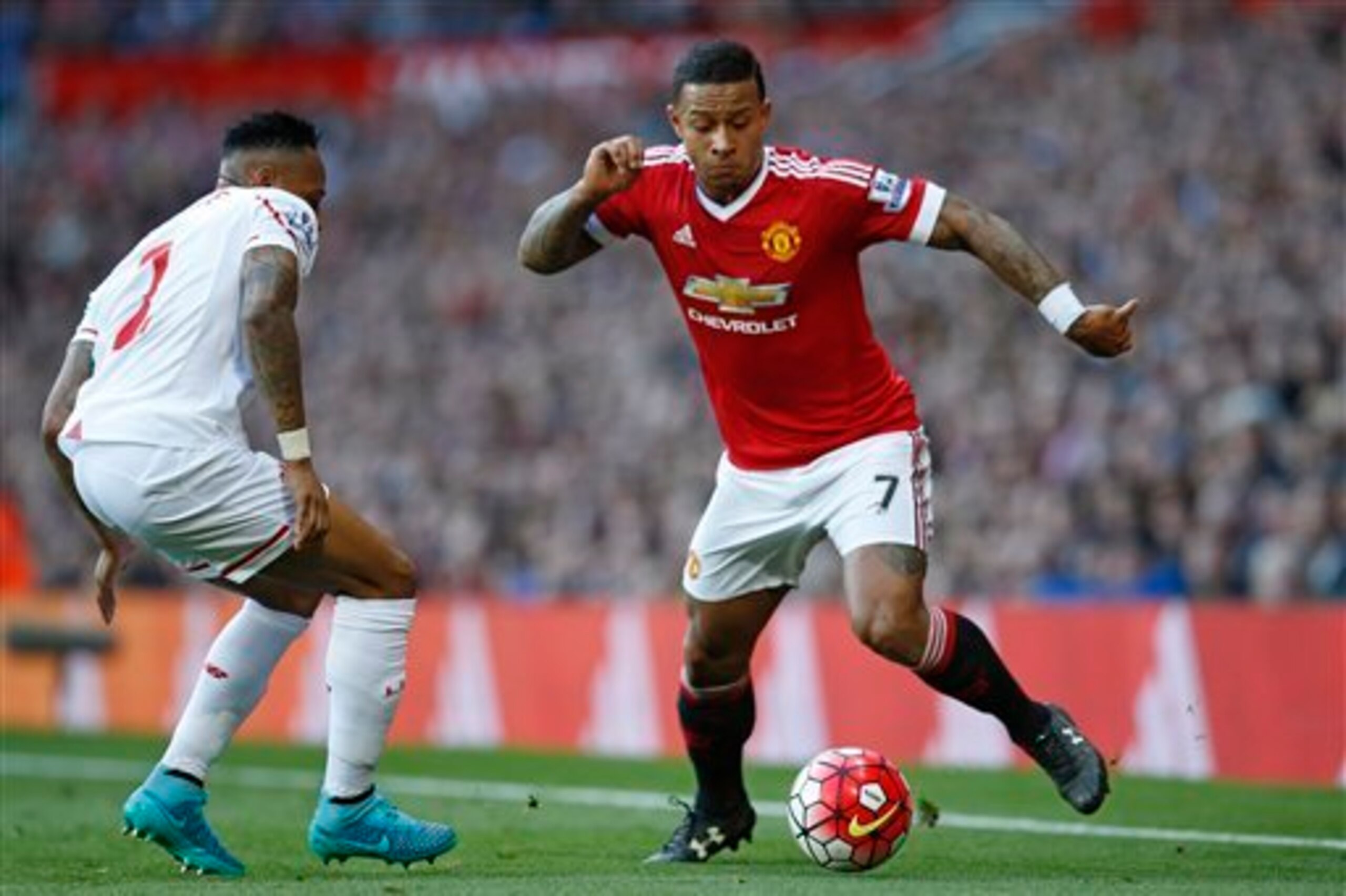 Memphis and Clyne face off in the league game between the two sides at Old Trafford earlier this season.