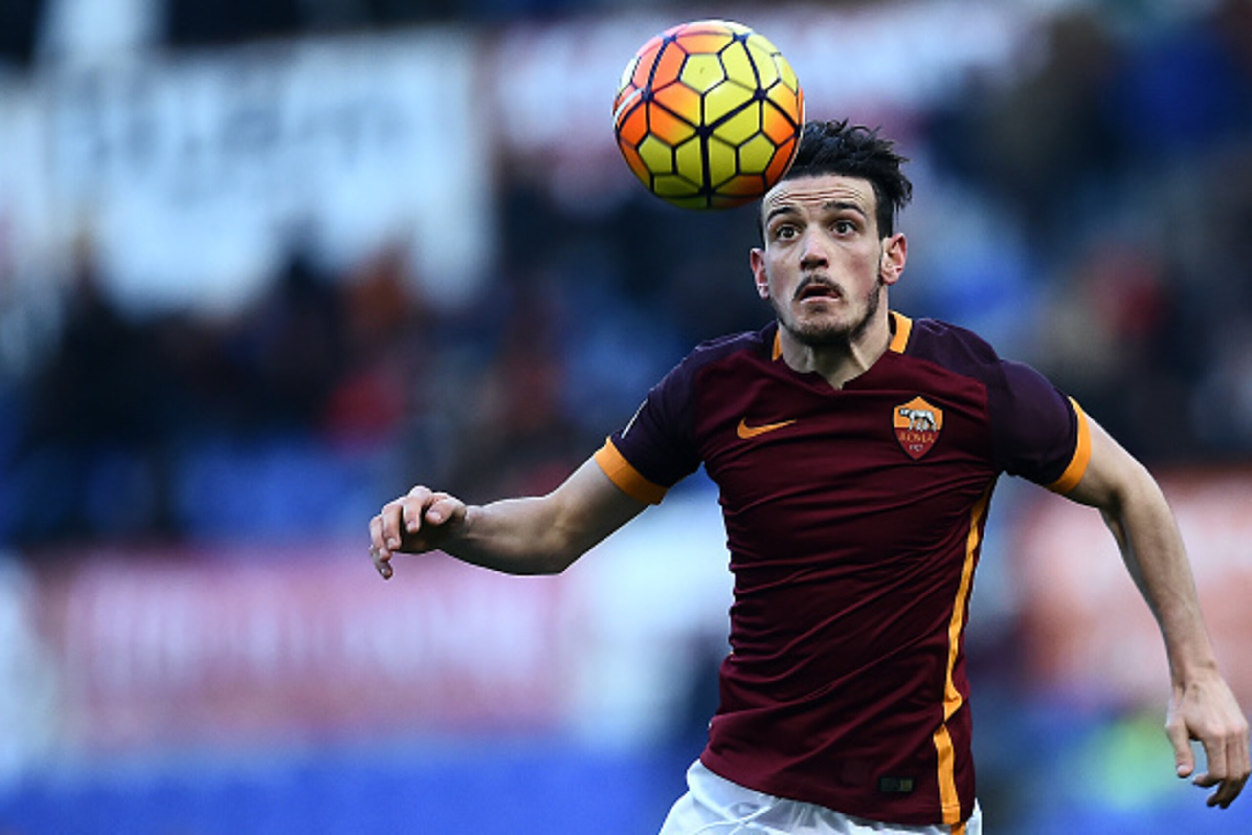 Roma's midfielder from Italy Alessandro Florenzi eyes the ball during the Italian Serie A football match AS Roma vs Hellas Verona at the Olympic Stadium in Rome on January 17, 2016. / AFP / FILIPPO MONTEFORTE        (Photo credit should read FILIPPO MONTE