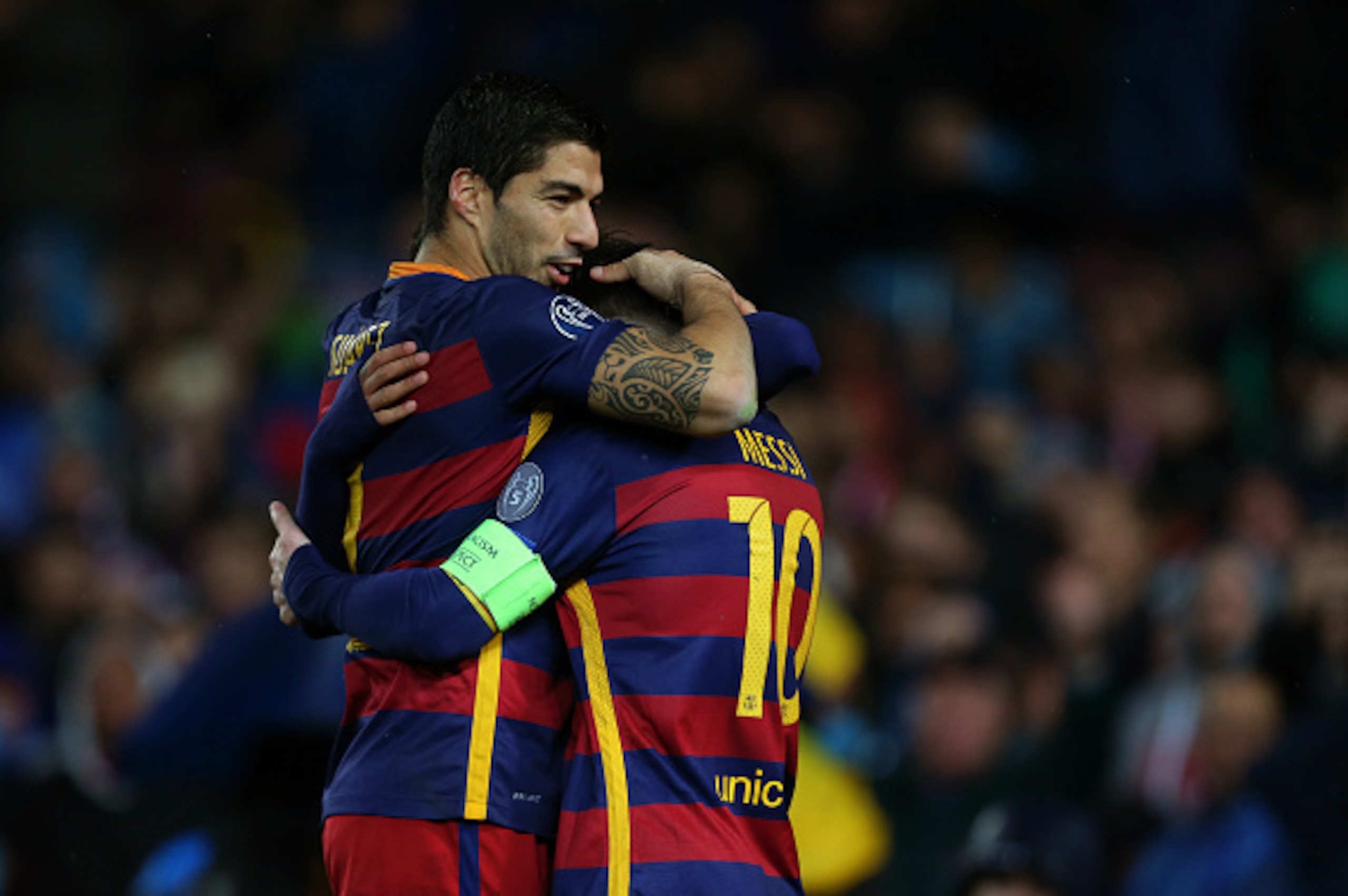 BARCELONA, SPAIN - MARCH 16:  Luis Suarez of FC Barcelona celebrates with Lionel Messi of FC Barcelona  during the UEFA Champions League match between FC Barcelona and Arsenal at Camp Nou on March 16, 2016 in Barcelona, Spain.  (Photo by Catherine Ivill -