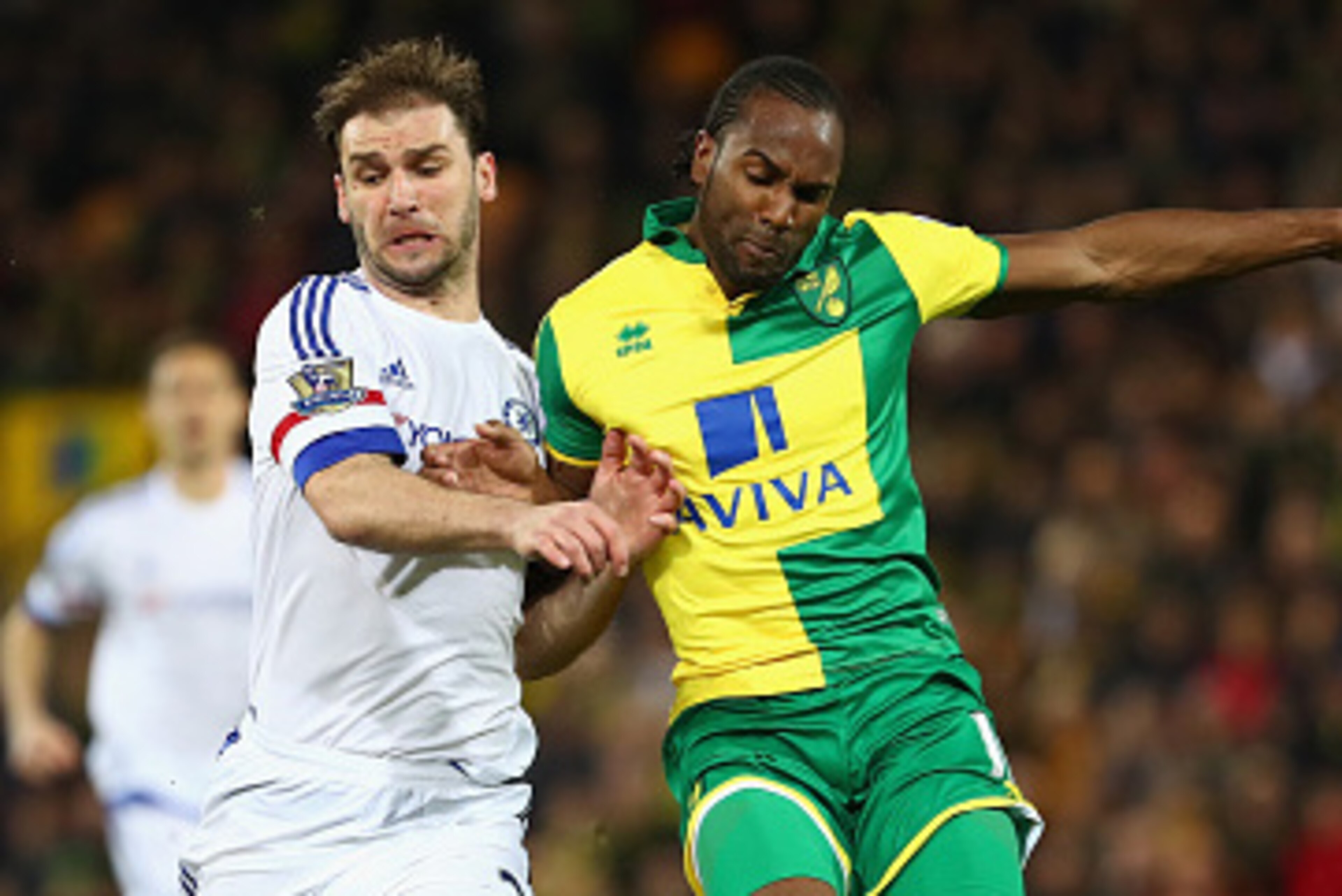 NORWICH, ENGLAND - MARCH 01:  Branislav Ivanovic of Chelsea battles with Cameron Jerome of Norwich during the Barclays Premier League match between Norwich City and Chelsea at Carrow Road on March 1, 2016 in Norwich, England.  (Photo by Julian Finney/Gett