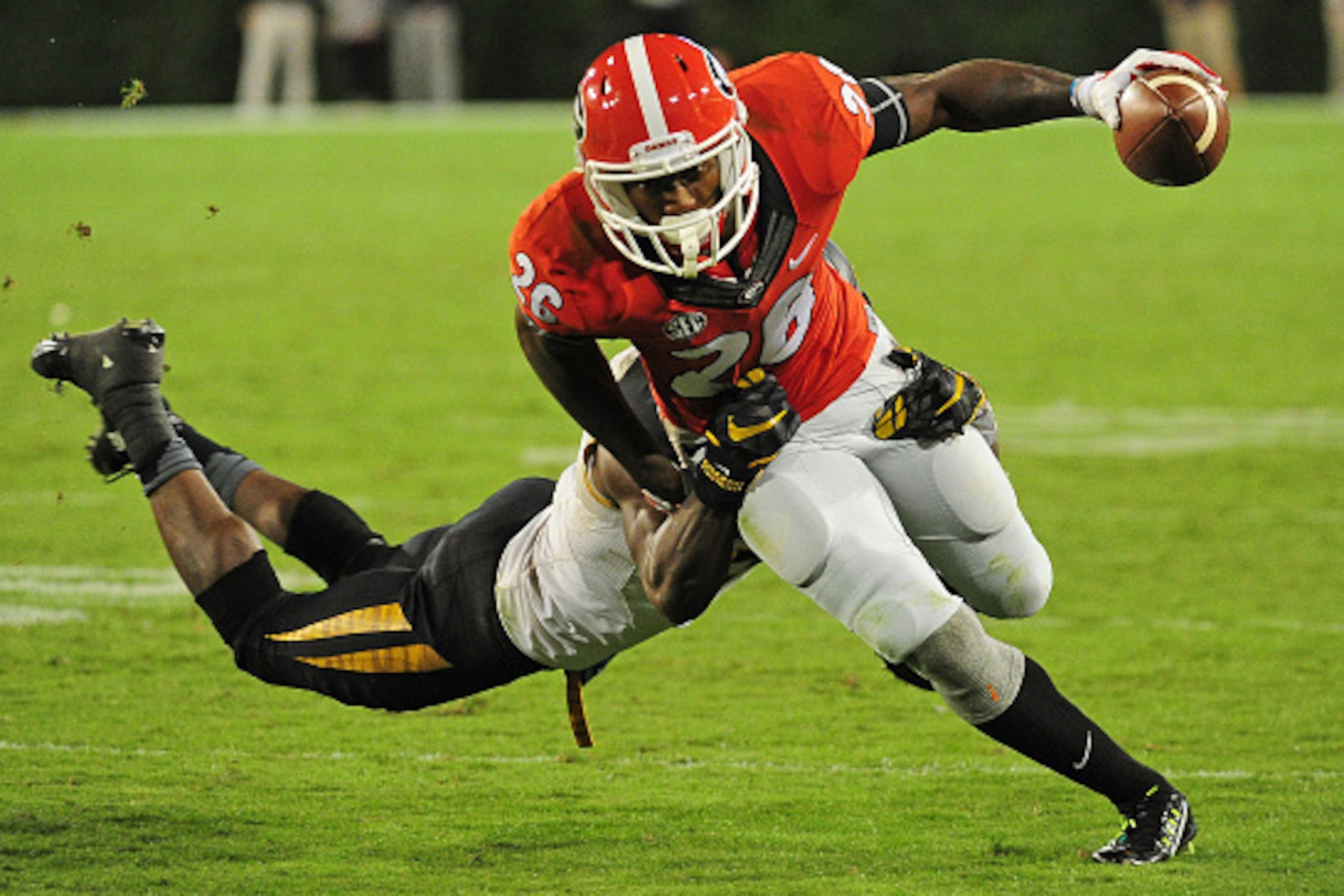 ATHENS, GA - OCTOBER 17: Malcolm Mitchell #26 of the Georgia Bulldogs runs with a catch against Kenya Dennis #7 of the Missouri Tigers on October 17, 2015 in Atlanta, Georgia. Photo by Scott Cunningham/Getty Images) ATHENS, GA - OCTOBER 17: Malcolm Mitchell #26 of the Georgia Bulldogs runs with a catch against Kenya Dennis #7 of the Missouri Tigers on October 17, 2015 in Atlanta, Georgia. Photo by Scott Cunningham/Getty Images)