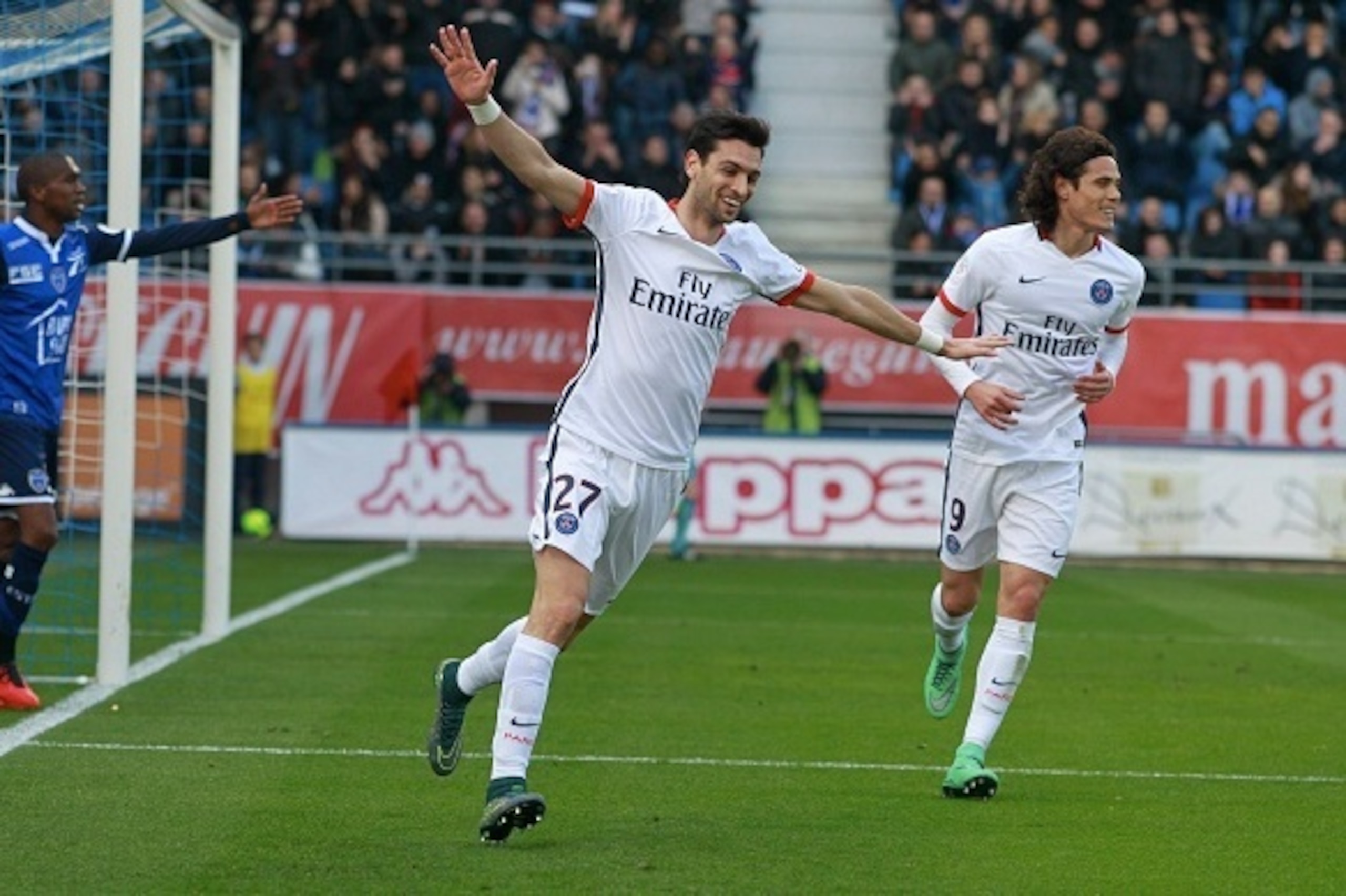 TROYES, FRANCE - MARCH 13:  Javier Pastore of Paris Saint-Germain celebrate his goal with Edinson Cavani during the French  Ligue 1 between ESTAC Troyes and Paris Saint-Germain at Stade de l'Aube on march 13, 2016 in Troyes, France.  (Photo by Xavier Lain