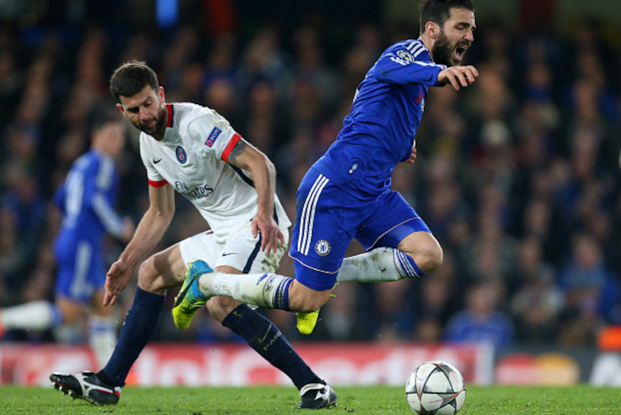 LONDON, ENGLAND - MARCH 09:  Thiago Motta of Paris Saint Germain and Cesc Fabregas of Chelsea during the UEFA Champions League match between Chelsea and Paris Saint-Germain at Stamford Bridge on March 9, 2016 in London, United Kingdom.  (Photo by Catherin