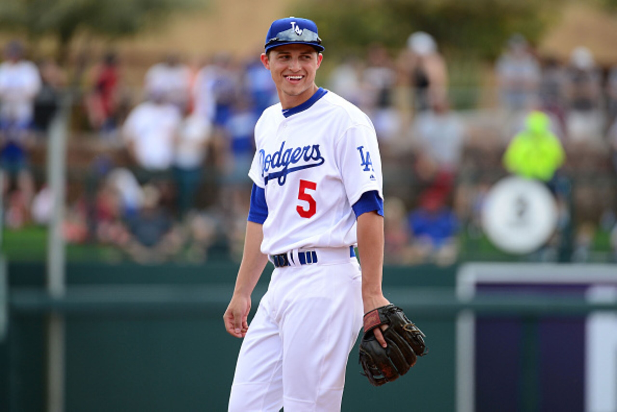 GLENDALE, AZ - MARCH 05:  Infielder Corey Seager #5 of the Los Angeles Dodgers laughs on the field during the spring training game against the Arizona Diamondbacks at Camelback Ranch on March 5, 2016 in Glendale, Arizona.  (Photo by Jennifer Stewart/Getty