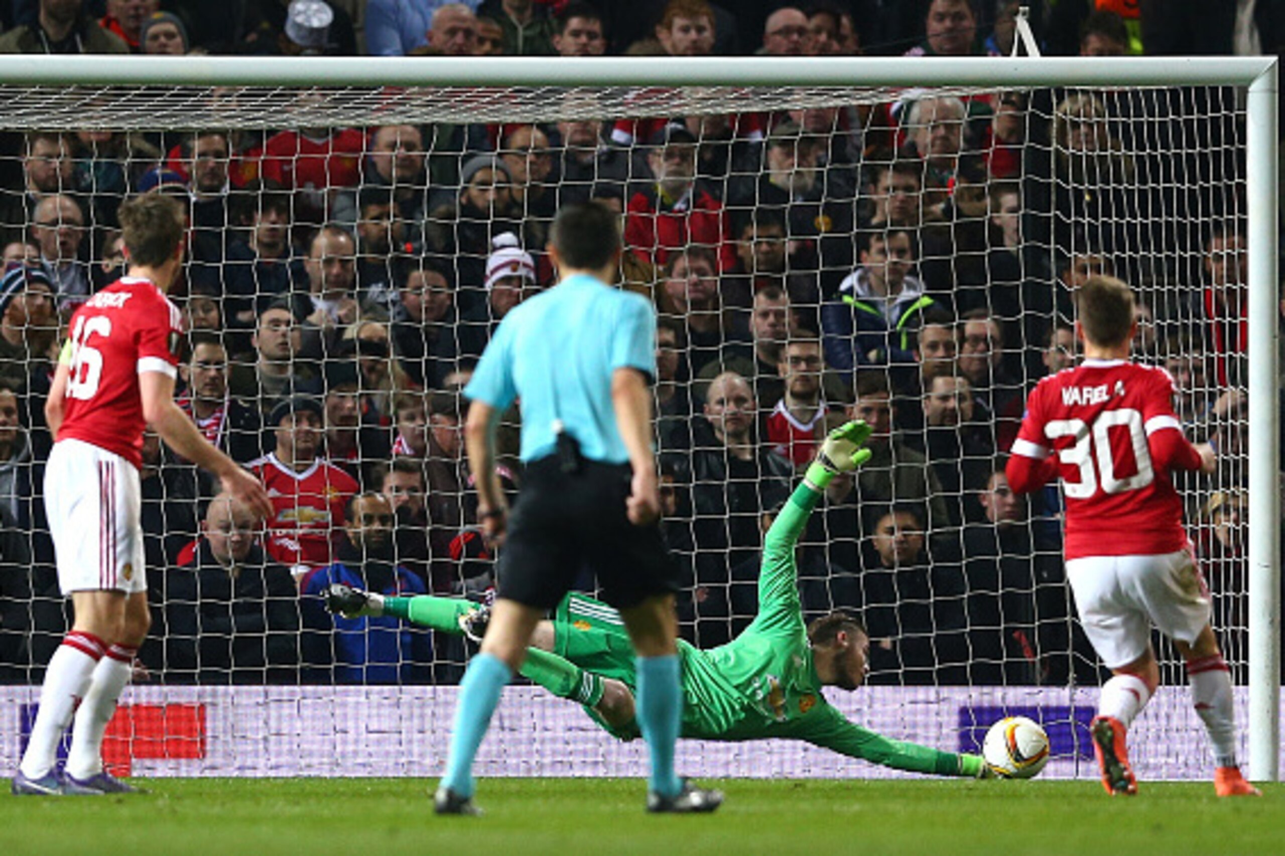 MANCHESTER, ENGLAND - MARCH 17:  Goalkeeper David De Gea of Manchester United stretches to make a save during the UEFA Europa League round of 16, second leg match between Manchester United and Liverpool at Old Trafford on March 17, 2016 in Manchester, Eng