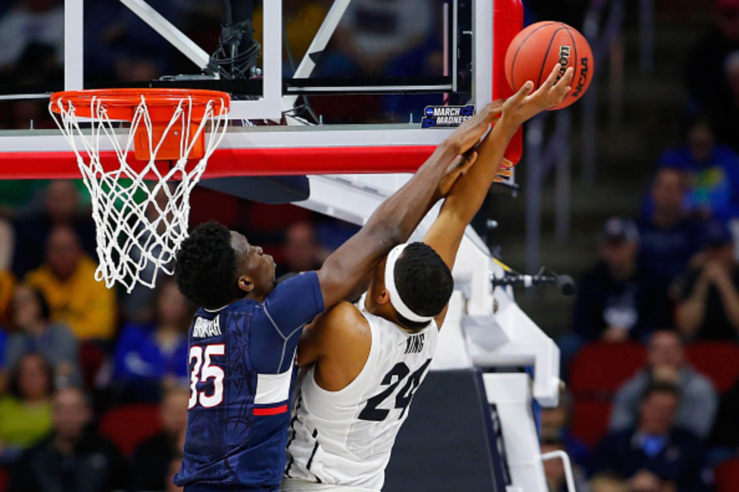 DES MOINES, IA - MARCH 17: Amida Brimah #35 of the Connecticut Huskies defends George King #24 of the Colorado Buffaloes in the second half during the first round of the 2016 NCAA Men's Basketball Tournament at Wells Fargo Arena on March 17, 2016 in Des M