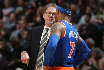 DENVER, CO - MARCH 08:  Head coach Kurt Rambis of the New York Knicks talks to Carmelo Anthony #7 of the New York Knicks as they face the Denver Nuggets at Pepsi Center on March 8, 2016 in Denver, Colorado. The Nuggets defeated the Knicks 110-94. NOTE TO 