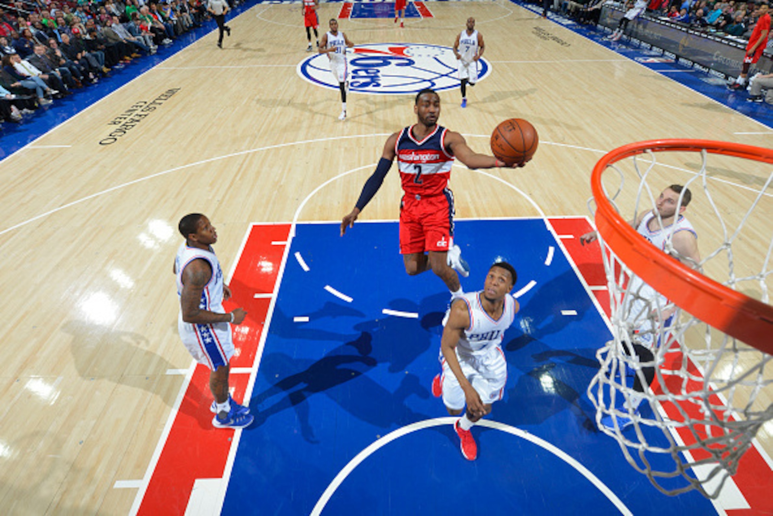 PHILADELPHIA,PA - MARCH 17:  John Wall #2 of the Washington Wizards goes up for the layup against the Philadelphia 76ers at Wells Fargo Center on March 17, 2016 in Philadelphia, Pennsylvania NOTE TO USER: User expressly acknowledges and agrees that, by do