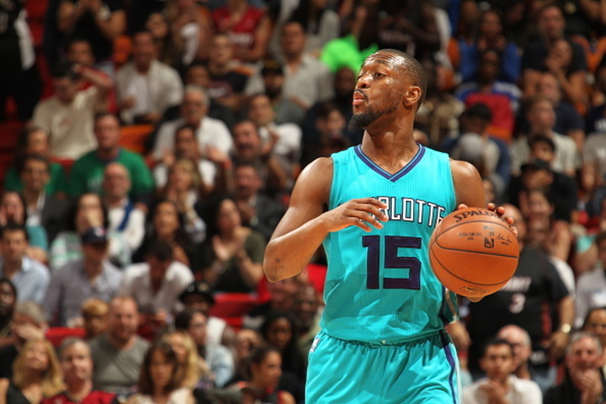 MIAMI, FL - MARCH 17:  Kemba Walker #15 of the Charlotte Hornets handles the ball against the Miami Heat on March 17, 2016 at AmericanAirlines Arena in Miami, Florida. NOTE TO USER: User expressly acknowledges and agrees that, by downloading and or using 