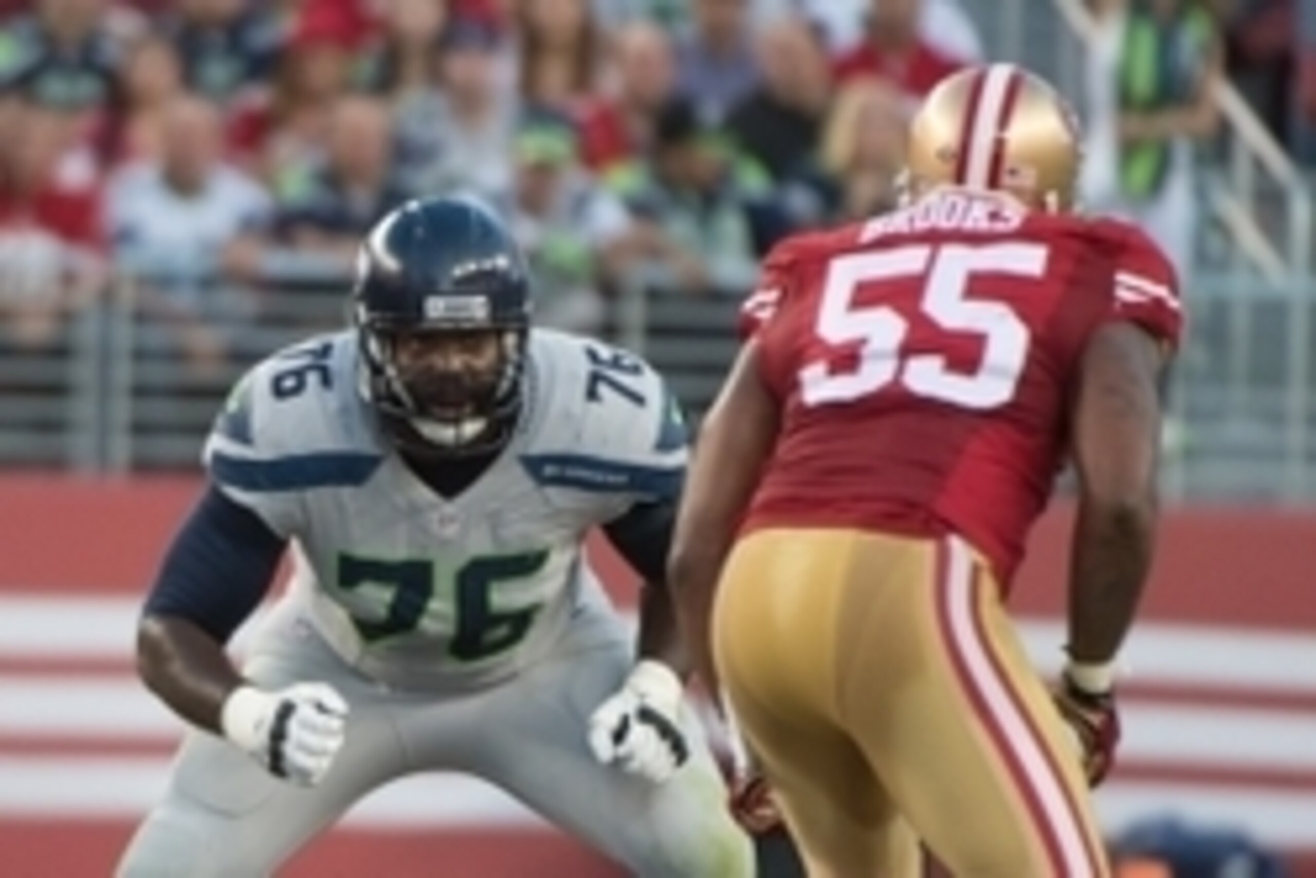 October 22, 2015; Santa Clara, CA, USA; Seattle Seahawks tackle Russell Okung (76) blocks San Francisco 49ers outside linebacker Ahmad Brooks (55) during the first quarter at Levi's Stadium. The Seahawks defeated the 49ers 20-3. Mandatory Credit: Kyle Ter