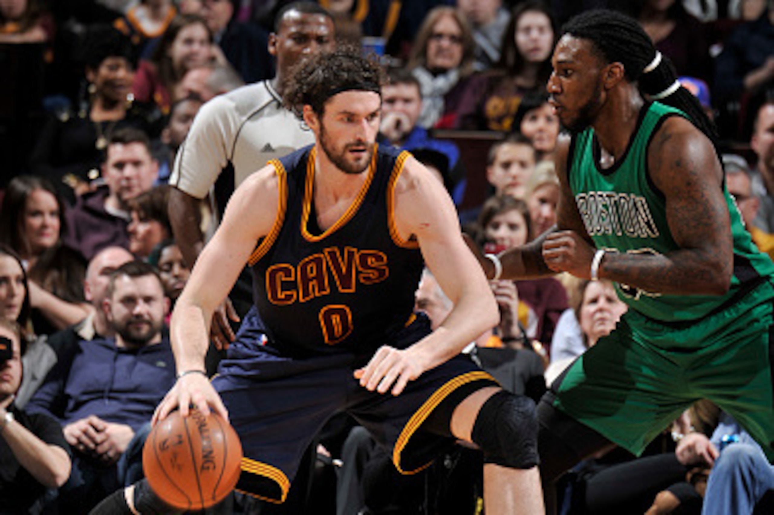 CLEVELAND, OH - FEBRUARY 5: Kevin Love #0 of the Cleveland Cavaliers handles the ball against the Boston Celtics on February 5, 2016 at Quicken Loans Arena in Cleveland, Ohio.  NOTE TO USER: User expressly acknowledges and agrees that, by downloading and 