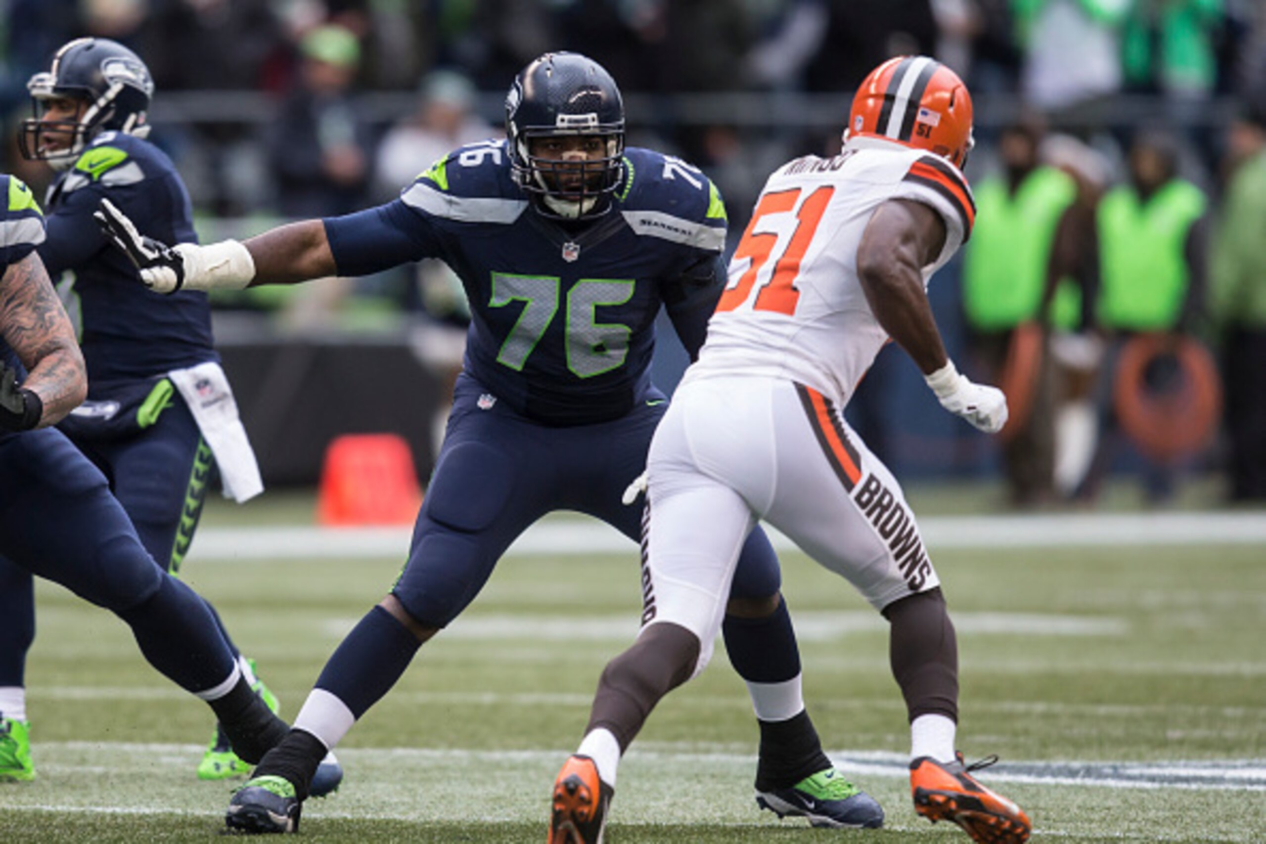 SEATTLE, WA - DECEMBER 20: Offensive lineman Russell Okung #76 pass blocks during the first half of a football game against the Cleveland Browns at CenturyLink Field on December 20, 2015 in Seattle, Washington. The Seahawks won the game 30-13. (Photo by S