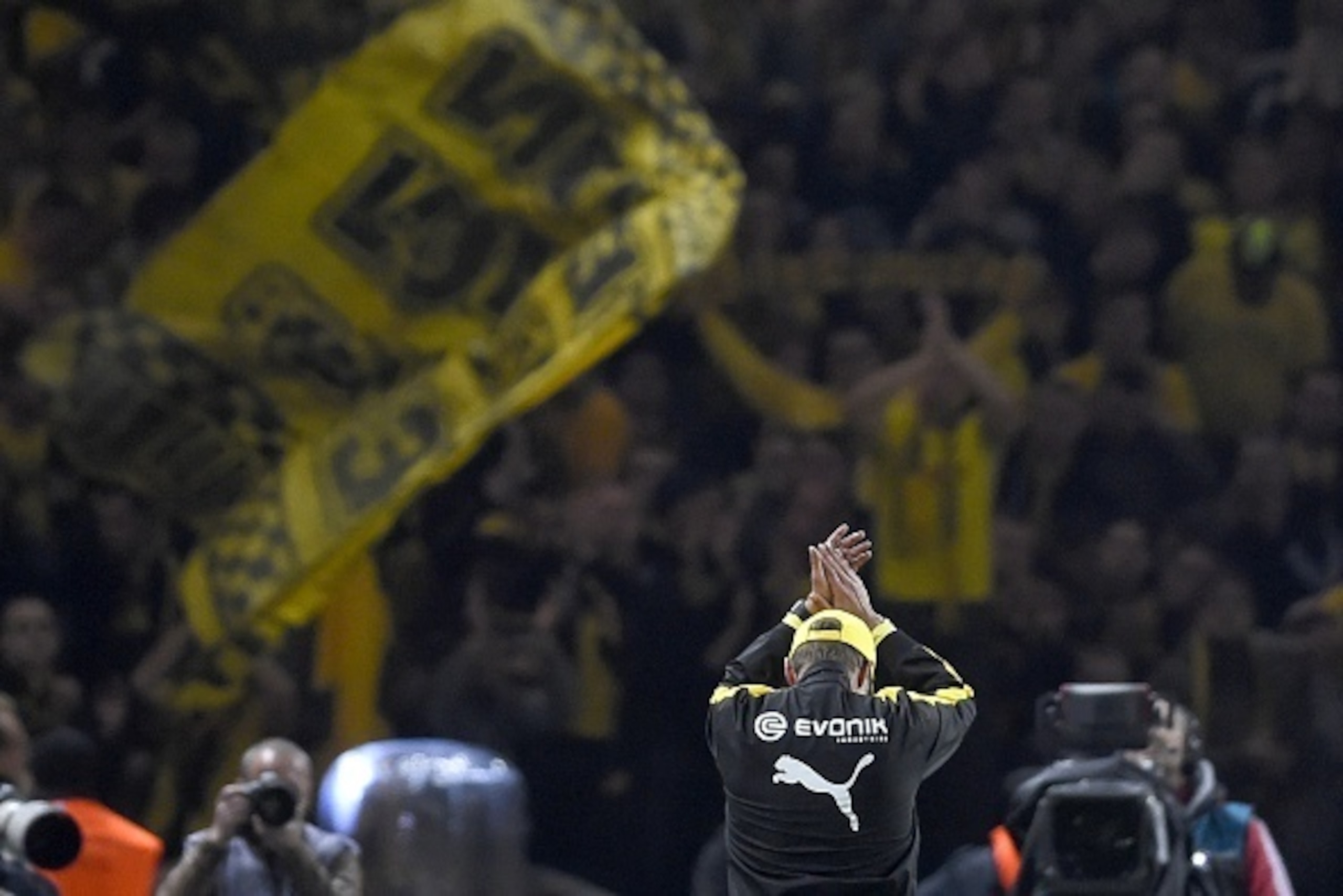 Dortmund's departing head coach Juergen Klopp acknowledges the fans after the German Cup DFB Pokal final football match between BVB Borussia Dortmund and VfL Wolfsburg at the Olympic Stadium in Berlin on May 30, 2015. Wolfsburg won the match 1-3. AFP PHOT Dortmund's departing head coach Juergen Klopp acknowledges the fans after the German Cup DFB Pokal final football match between BVB Borussia Dortmund and VfL Wolfsburg at the Olympic Stadium in Berlin on May 30, 2015. Wolfsburg won the match 1-3. AFP PHOT