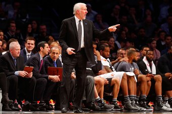 BROOKLYN, NJ - JANUARY 11:  (NEW YORK DAILIES OUT)    Head coach Gregg Popovich of the San Antonio Spurs in action against the Brooklyn Nets at Barclays Center on January 11, 2016 in the Brooklyn borough of New York City.  The Spurs defeated the Nets 106-