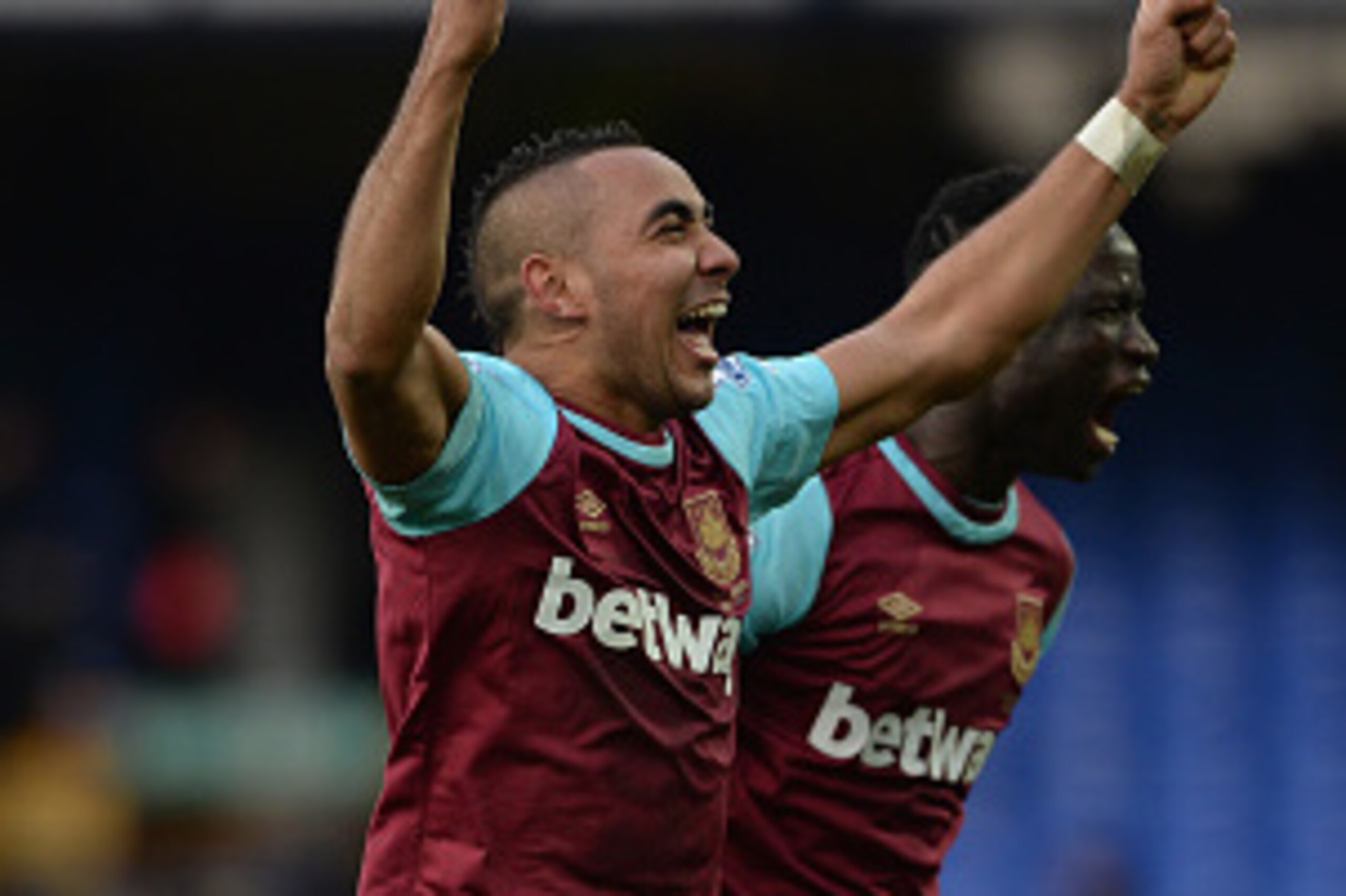 LIVERPOOL, ENGLAND - MARCH 05:  Dimitri Payet (L) of West Ham United celebrates the win after the Barclays Premier League match between Everton and West Ham United at Goodison Park on March 5, 2016 in Liverpool, England.  (Photo by Gareth Copley/Getty Ima