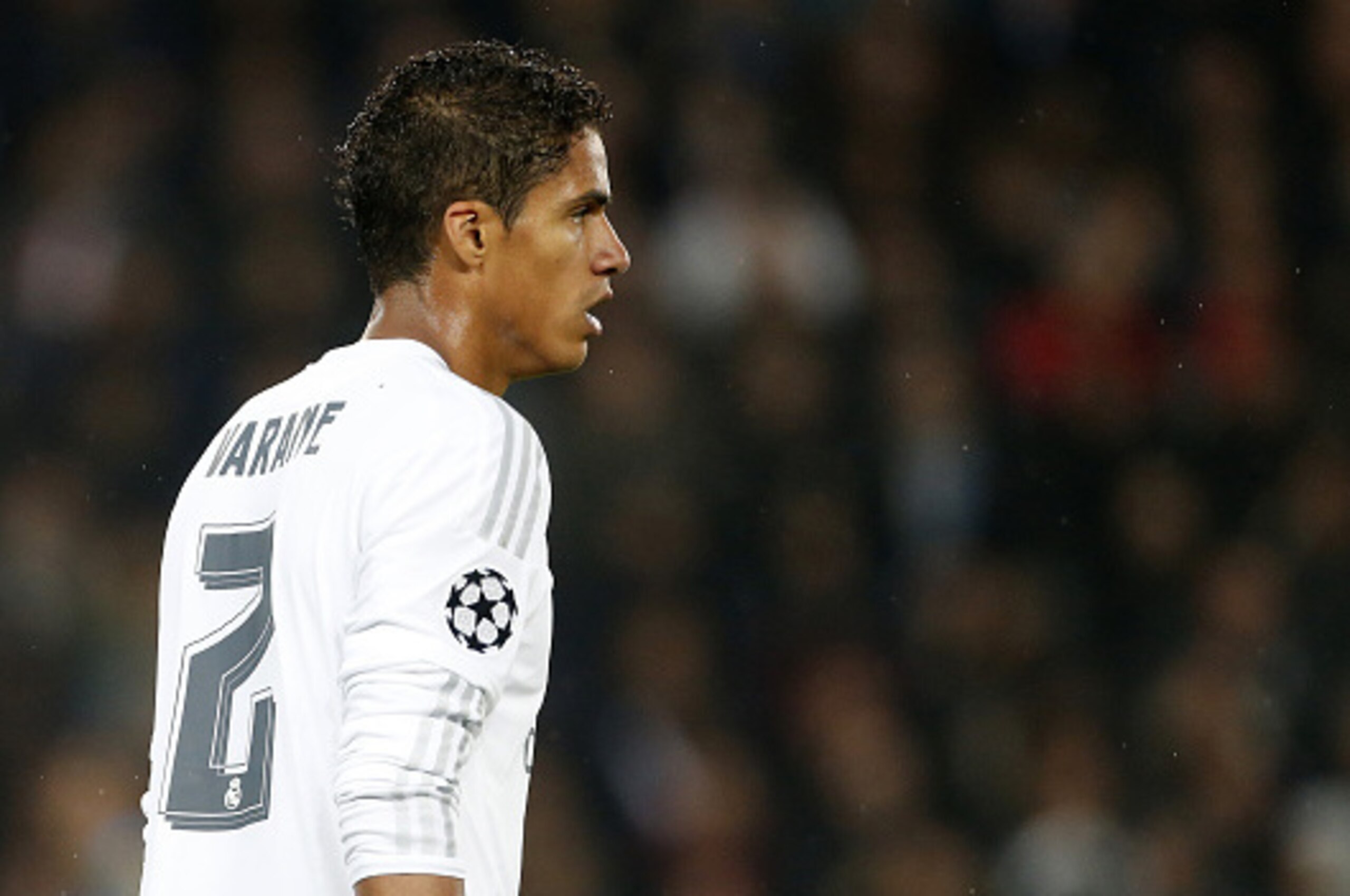 PARIS, FRANCE - OCTOBER 21: Raphael Varane of Real Madrid looks on during the UEFA Champions League match between Paris Saint-Germain (PSG) and Real Madrid at Parc des Princes stadium on October 21, 2015 in Paris, France. (Photo by Jean Catuffe/Getty Imag
