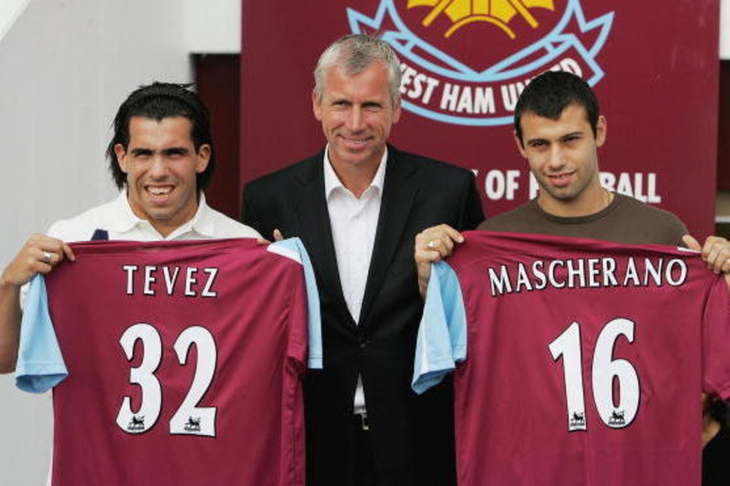 LONDON - SEPTEMBER 05: (L-R) Carlos Tevez, West Ham manager Alan Pardew and Javier Mascherano pose with their squad numbers during a West Ham United press conference to unveil the new signings at Upton Park on September 5, 2006 in London, England. (Phot LONDON - SEPTEMBER 05: (L-R) Carlos Tevez, West Ham manager Alan Pardew and Javier Mascherano pose with their squad numbers during a West Ham United press conference to unveil the new signings at Upton Park on September 5, 2006 in London, England. (Phot