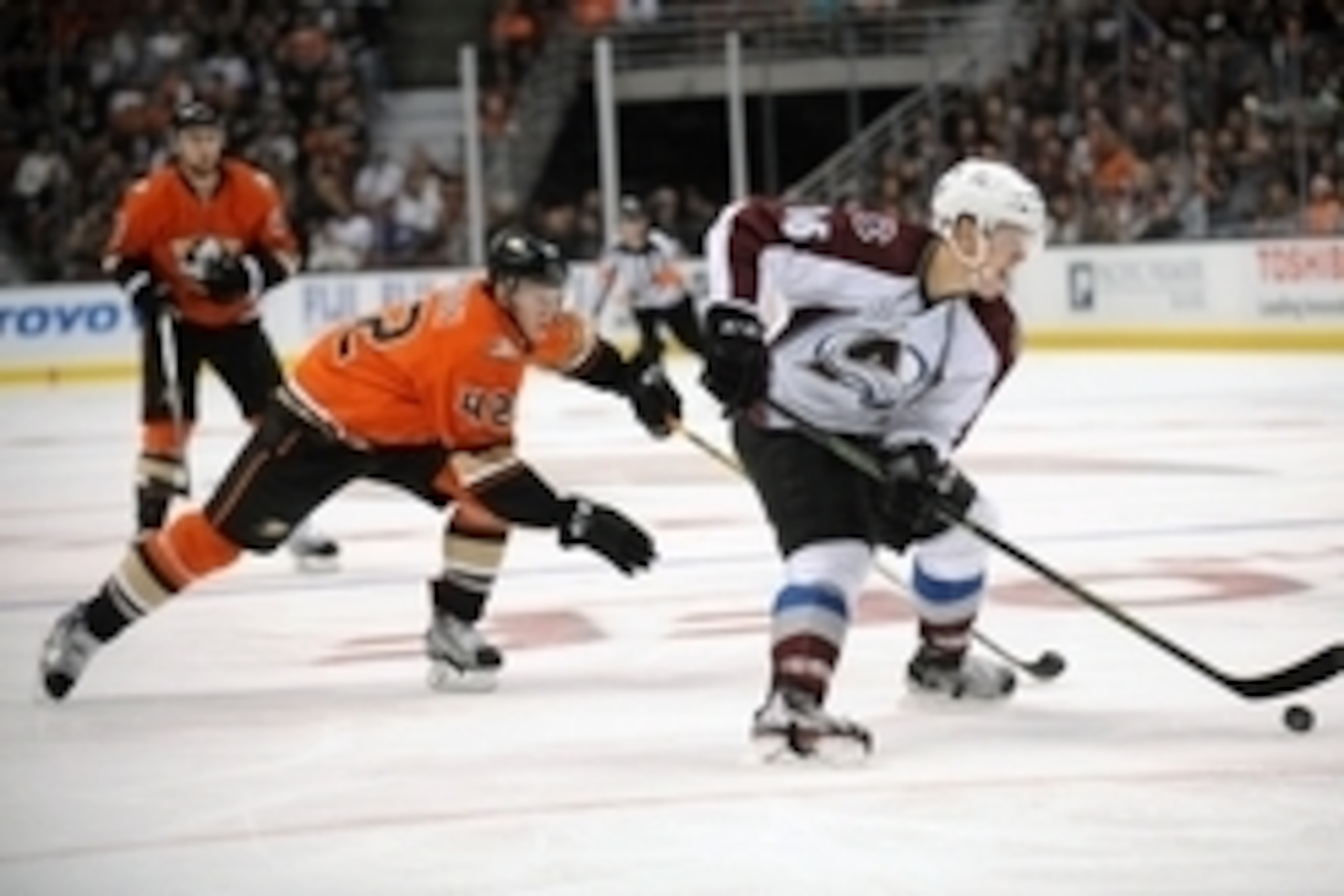 October 16, 2015; Anaheim, CA, USA; Colorado Avalanche right wing Mikko Rantanen (96) moves the puck ahead of Anaheim Ducks defenseman Josh Manson (42) during the third period at Honda Center. Mandatory Credit: Gary A. Vasquez-USA TODAY Sports