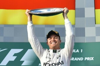 Mercedes AMG Petronas F1 Team's German driver Nico Rosberg celebrates winning the Formula One Australian Grand Prix in Melbourne on March 20, 2016.  / AFP / PETER PARKS / IMAGE RESTRICTED TO EDITORIAL USE - STRICTLY NO COMMERCIAL USE        (Photo credit 