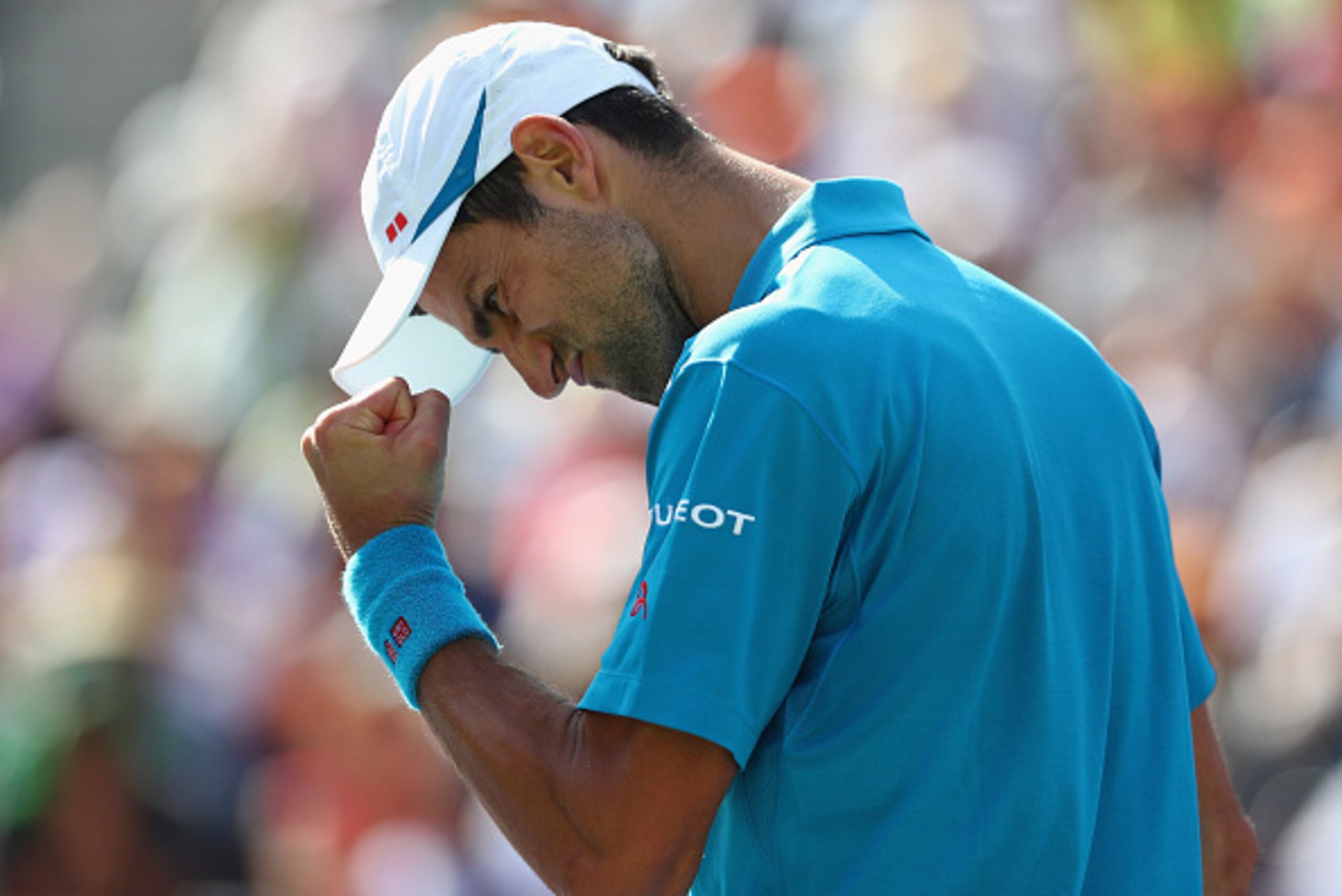 INDIAN WELLS, CA - MARCH 19:  Novak Djokovic of Serbia celebrates against Rafael Nadal of Spain in the semi finals during day thirteen of the BNP Paribas Open at Indian Wells Tennis Garden on March 19, 2016 in Indian Wells, California.  (Photo by Julian F