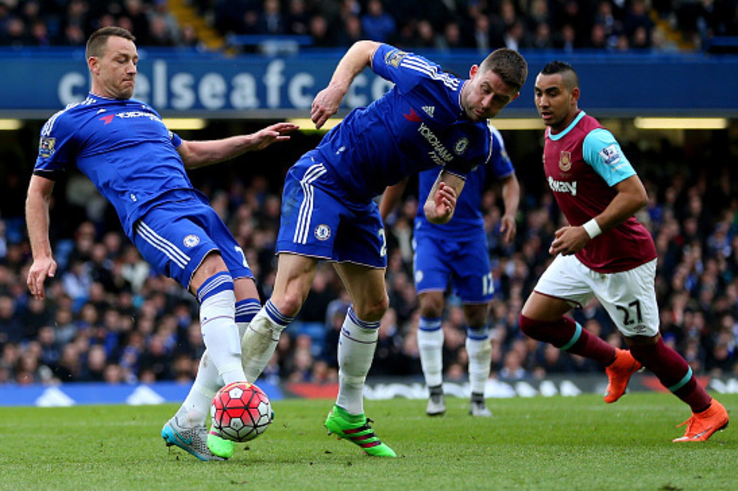LONDON, ENGLAND - MARCH 19 :  John Terry and Gary Cahill of Chelsea both go for the ball during the Barclays Premier League match between Chelsea and West Ham United at Stamford Bridge on March 19, 2016 in London, England.  (Photo by Catherine Ivill - AMA