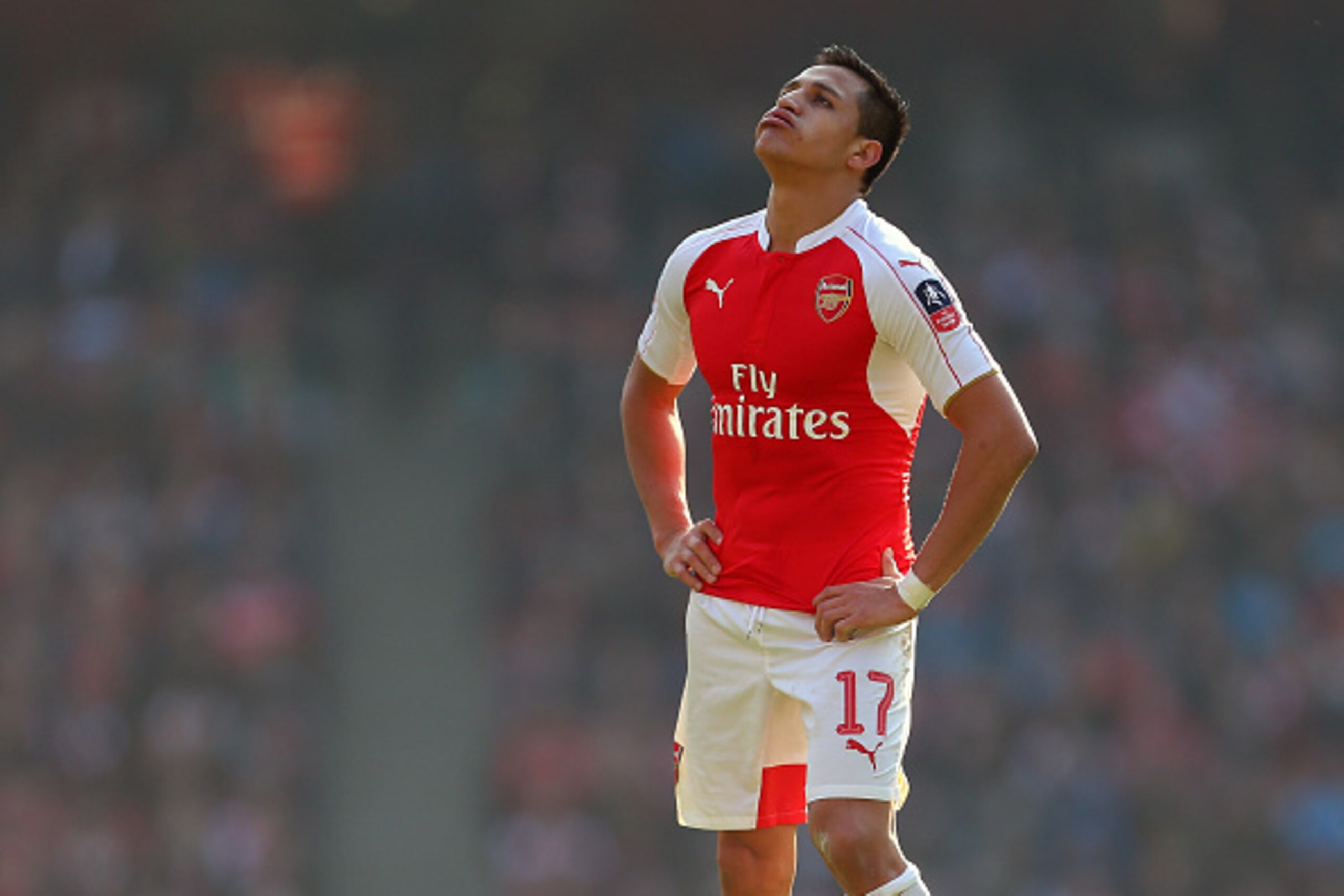 LONDON, ENGLAND - MARCH 13 :  A dejected looking Alexis Sanchez of Arsenal during the Emirates FA Cup match between Arsenal and Watford at the Emirates Stadium on March 13, 2016 in London, England.  (Photo by Catherine Ivill - AMA/Getty Images)