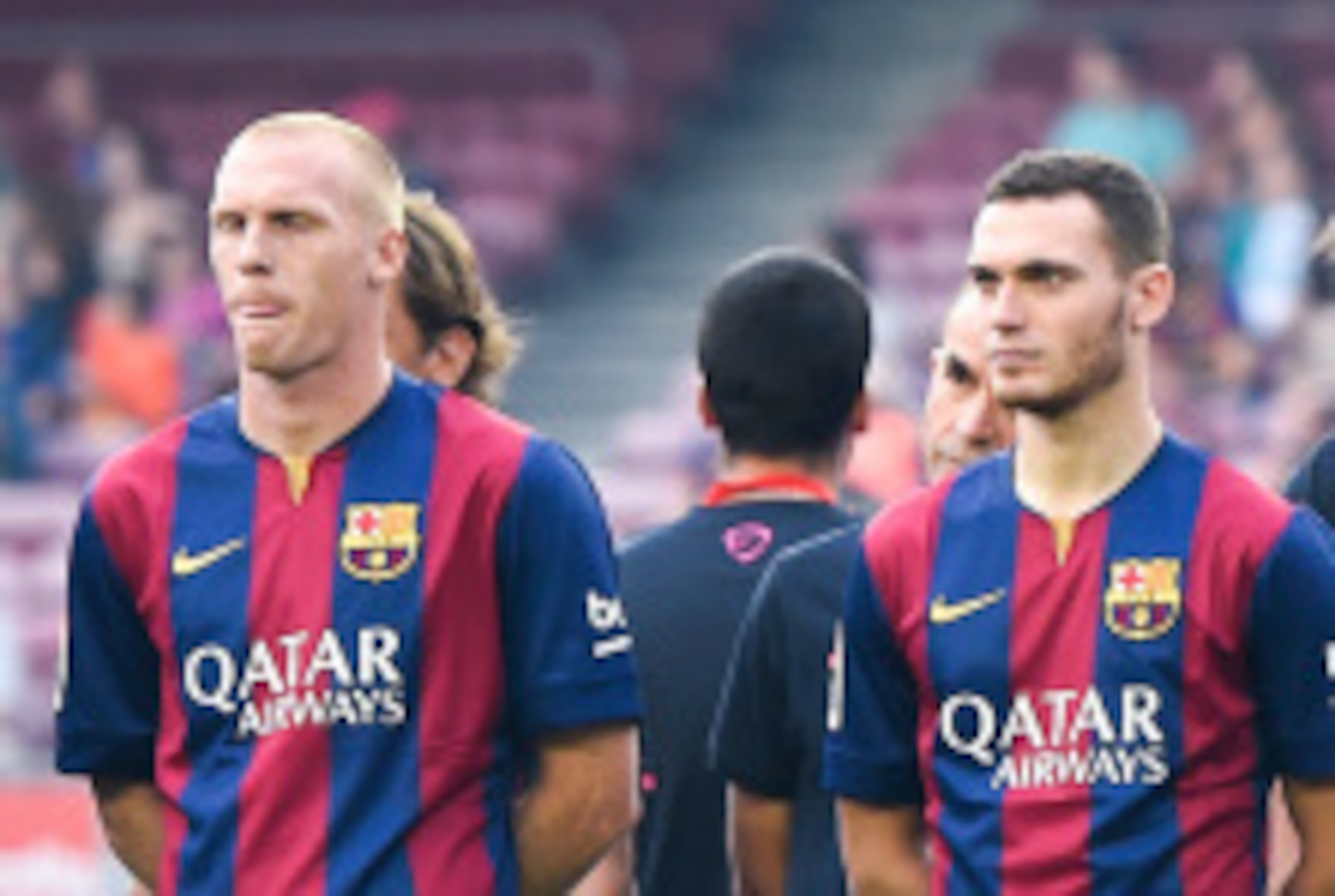 BARCELONA, SPAIN - AUGUST 18:  (L-R) Jeremy Mathieu, Thomas Vermaelen, Luis Suarez, Sergio Busquets and Lionel Messi of FC Barcelona looks on during the official presentation of the FC Barcelona prior to the Joan Gamper Trophy match between FC Barcelona a