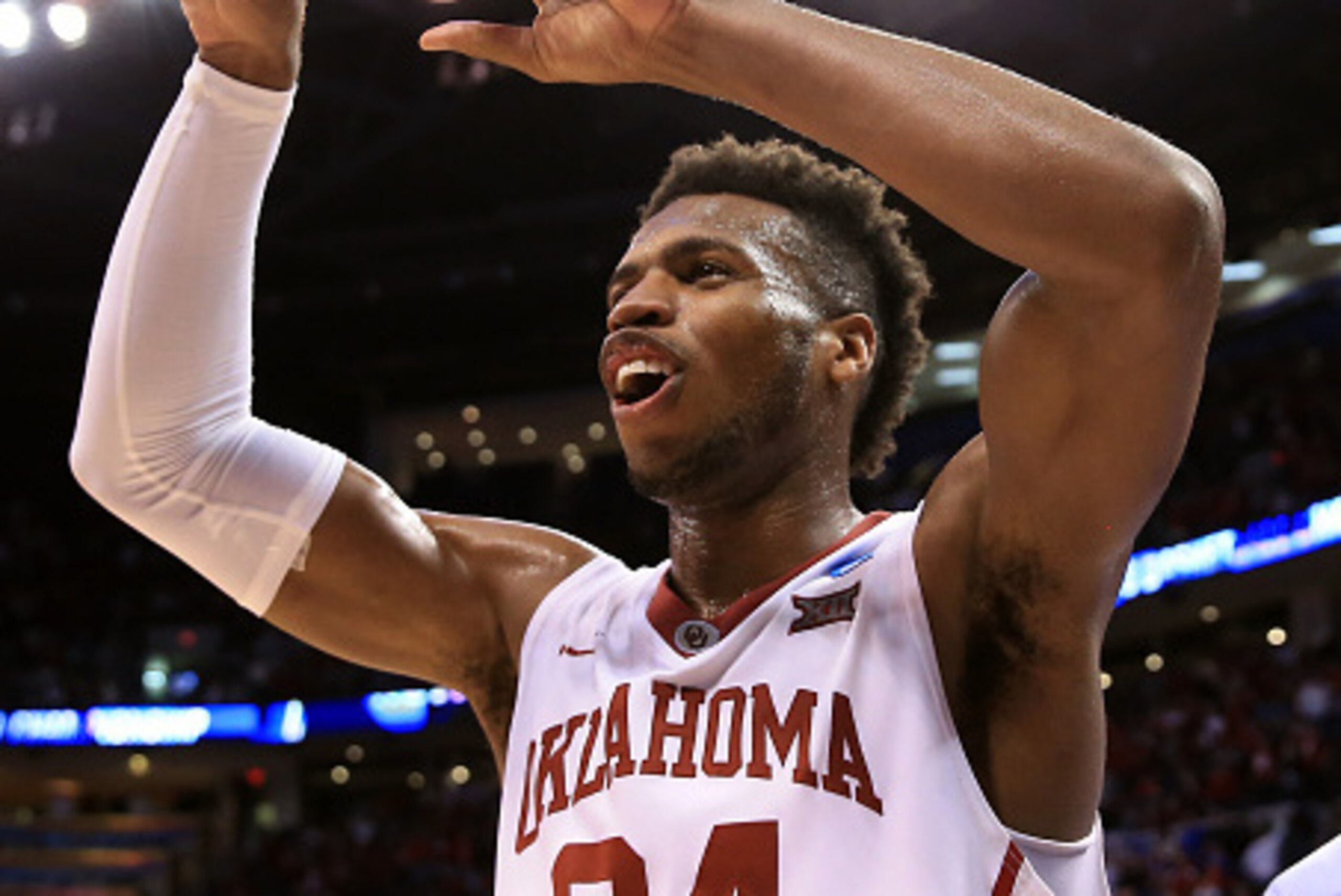 OKLAHOMA CITY, OK - MARCH 20:  Buddy Hield #24 of the Oklahoma Sooners celebrates after defeating the Virginia Commonwealth Rams with a score of 81 to 85 during the second round of the 2016 NCAA Men's Basketball Tournament at Chesapeake Energy Arena on Ma