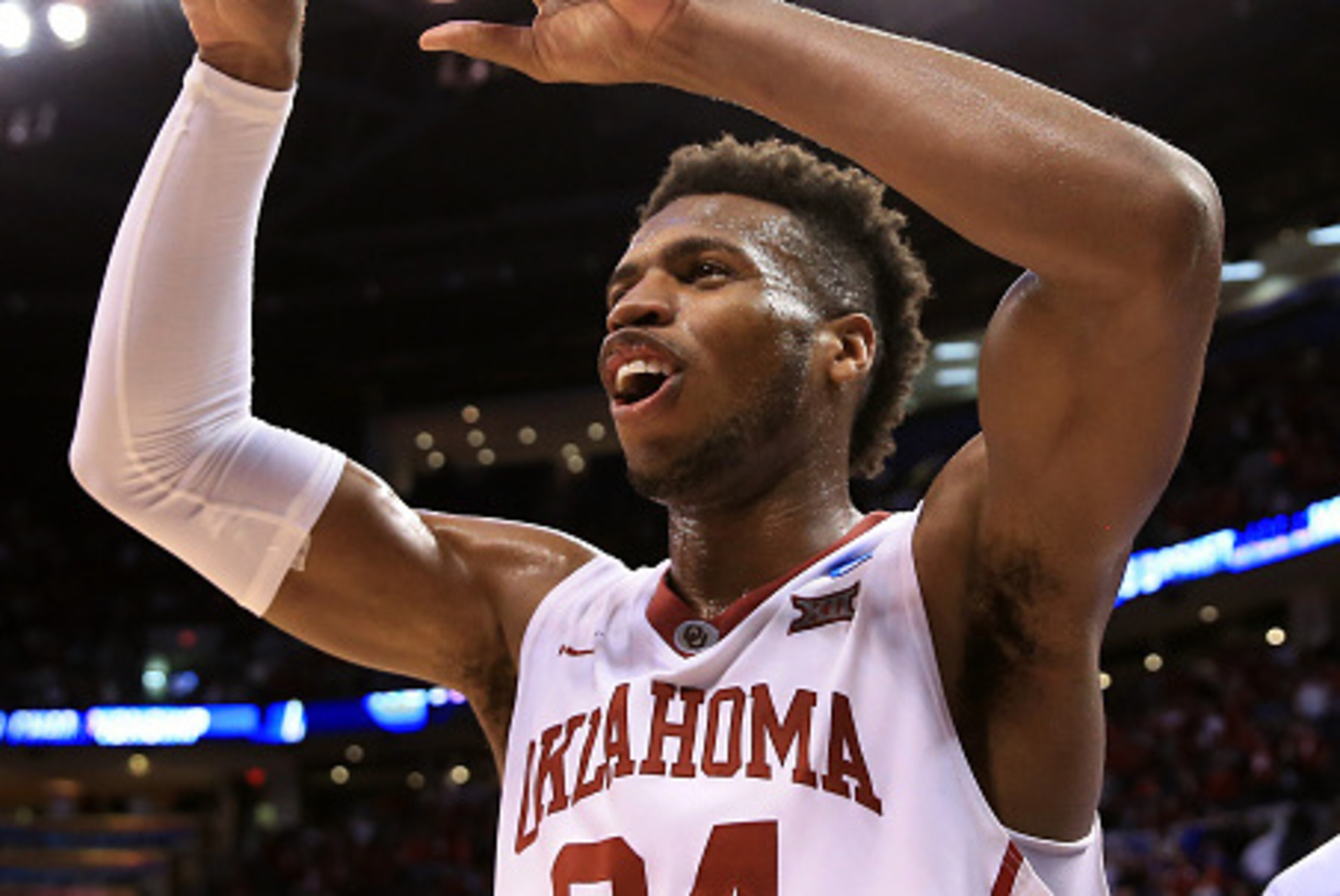 OKLAHOMA CITY, OK - MARCH 20:  Buddy Hield #24 of the Oklahoma Sooners celebrates after defeating the Virginia Commonwealth Rams with a score of 81 to 85 during the second round of the 2016 NCAA Men's Basketball Tournament at Chesapeake Energy Arena on Ma