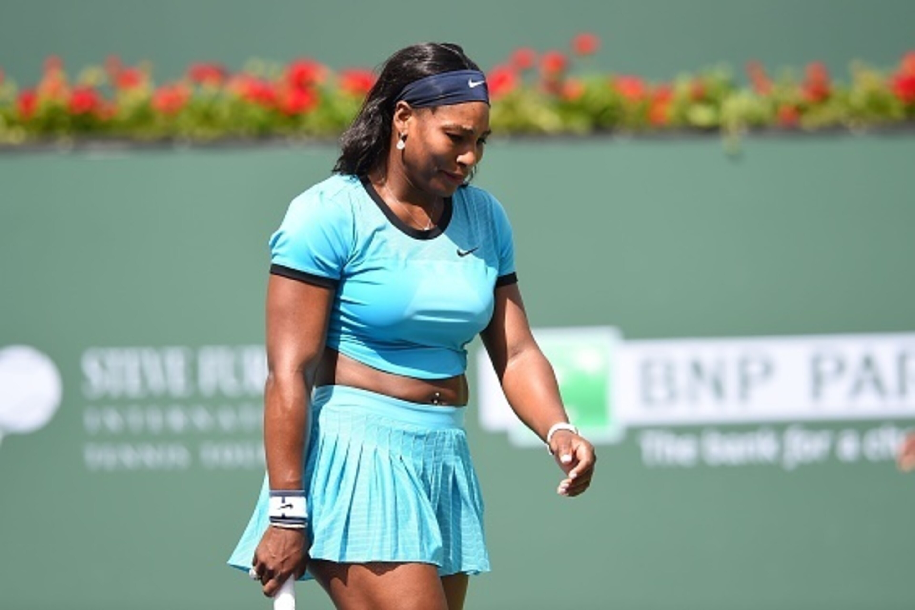 Serena Williams of USA reacts during the women's final match against Victoria Azarenka of Belarus in at the BNP Paribas Open at the Indian Wells Tennis Garden in Indian Wells, California, March 20, 2016.  Azarenka defeated Williams 6-4, 6-4. / AFP / ROBYN