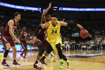SPOKANE, WA - MARCH 20:  Dillon Brooks #24 of the Oregon Ducks drives against James Demery #25 of the Saint Joseph's Hawks in the second half during the second round of the 2016 NCAA Men's Basketball Tournament at Spokane Veterans Memorial Arena on March 