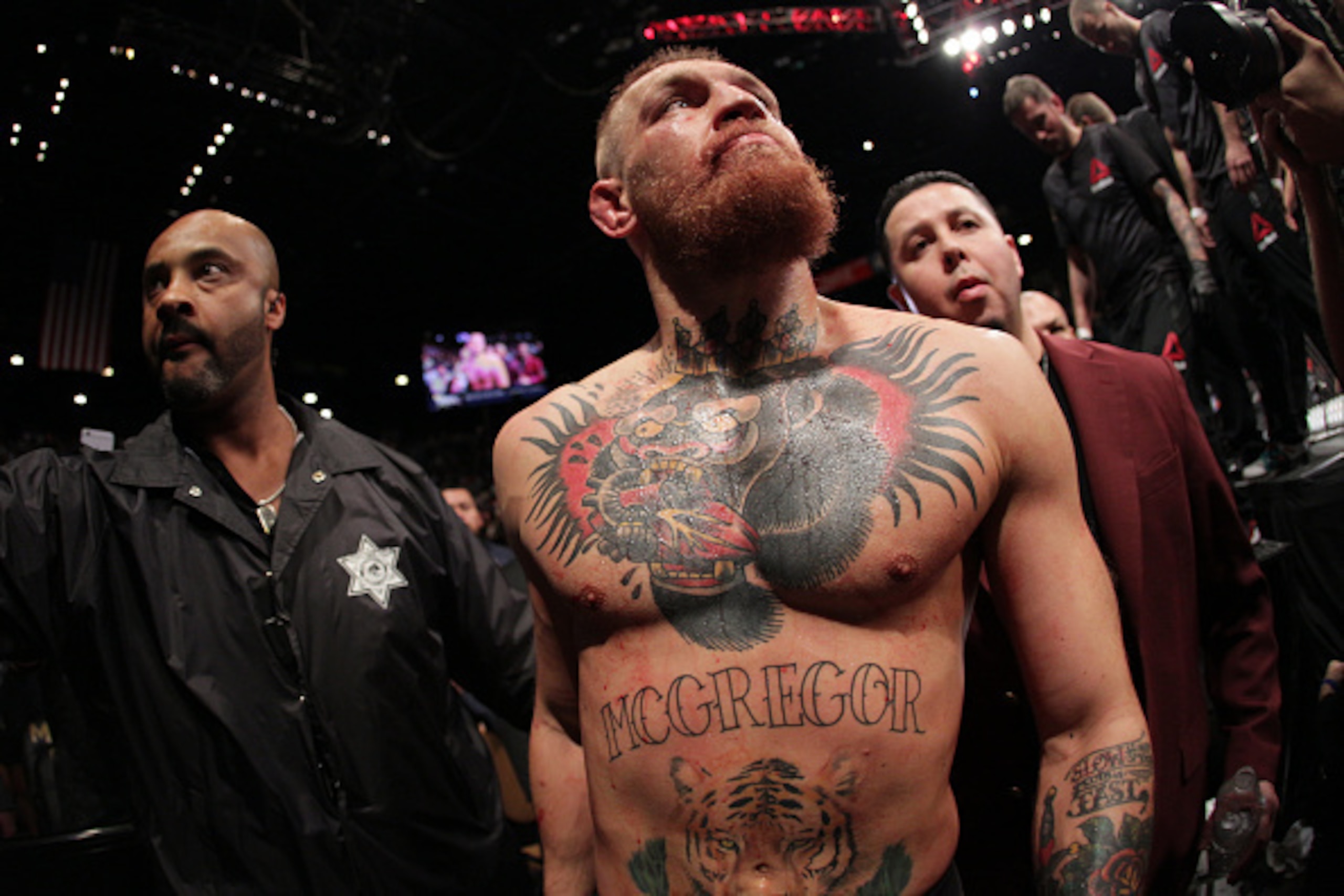 LAS VEGAS, NV - MARCH 5:  Conor McGregor exits the Octagon after his fight against Nate Diaz in their welterweight bout during the UFC 196 at the MGM Grand Garden Arena on March 5, 2016 in Las Vegas, Nevada. (Photo by Rey Del Rio/Getty Images)