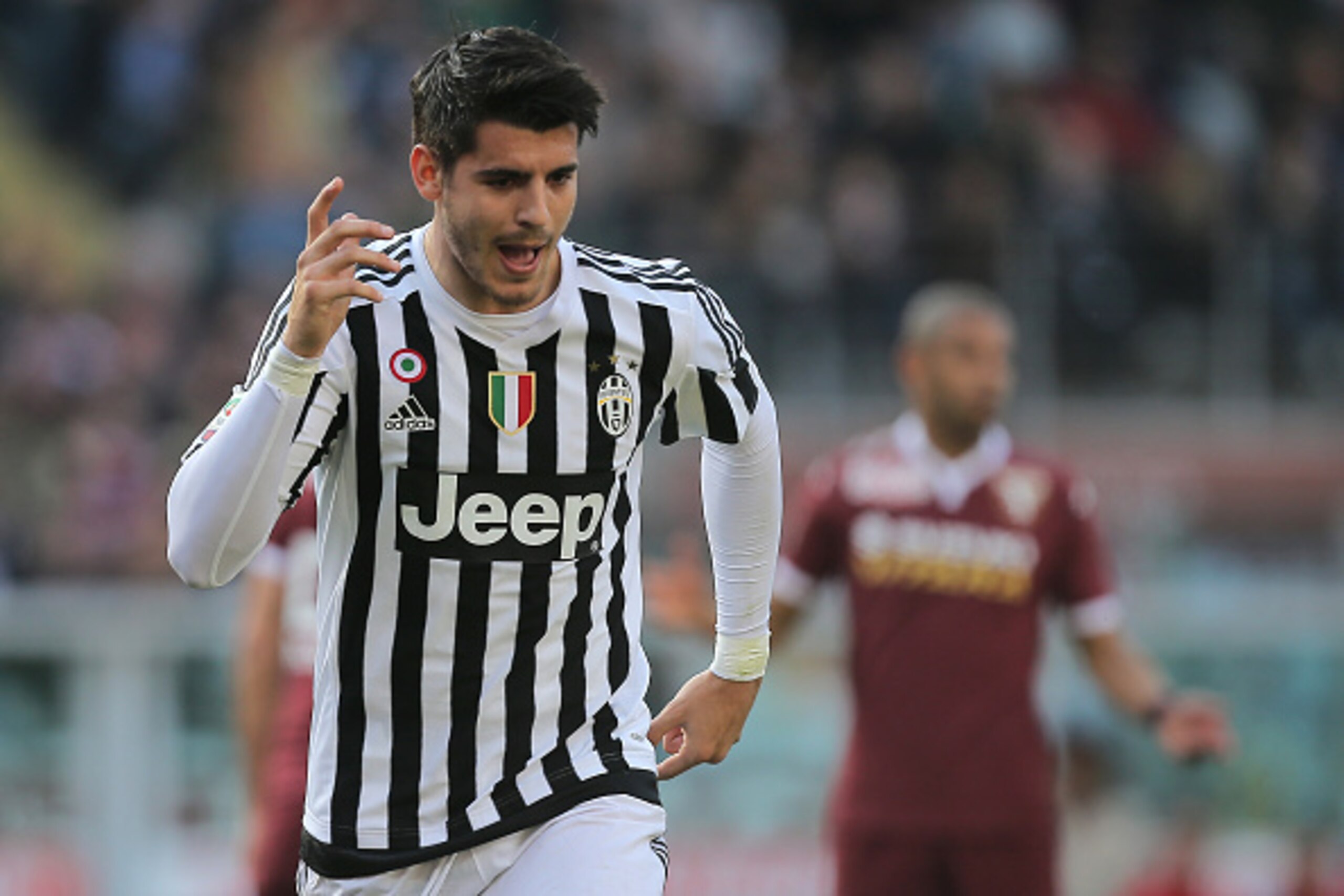 Juventus' forward Alvaro Morata from Spain celebrates after scoring during the Italian Serie A football match Torino Vs Juventus on March 20, 2016 at the 'Olympic Stadium' in Turin.  / AFP / MARCO BERTORELLO        (Photo credit should read MARCO BERTOREL