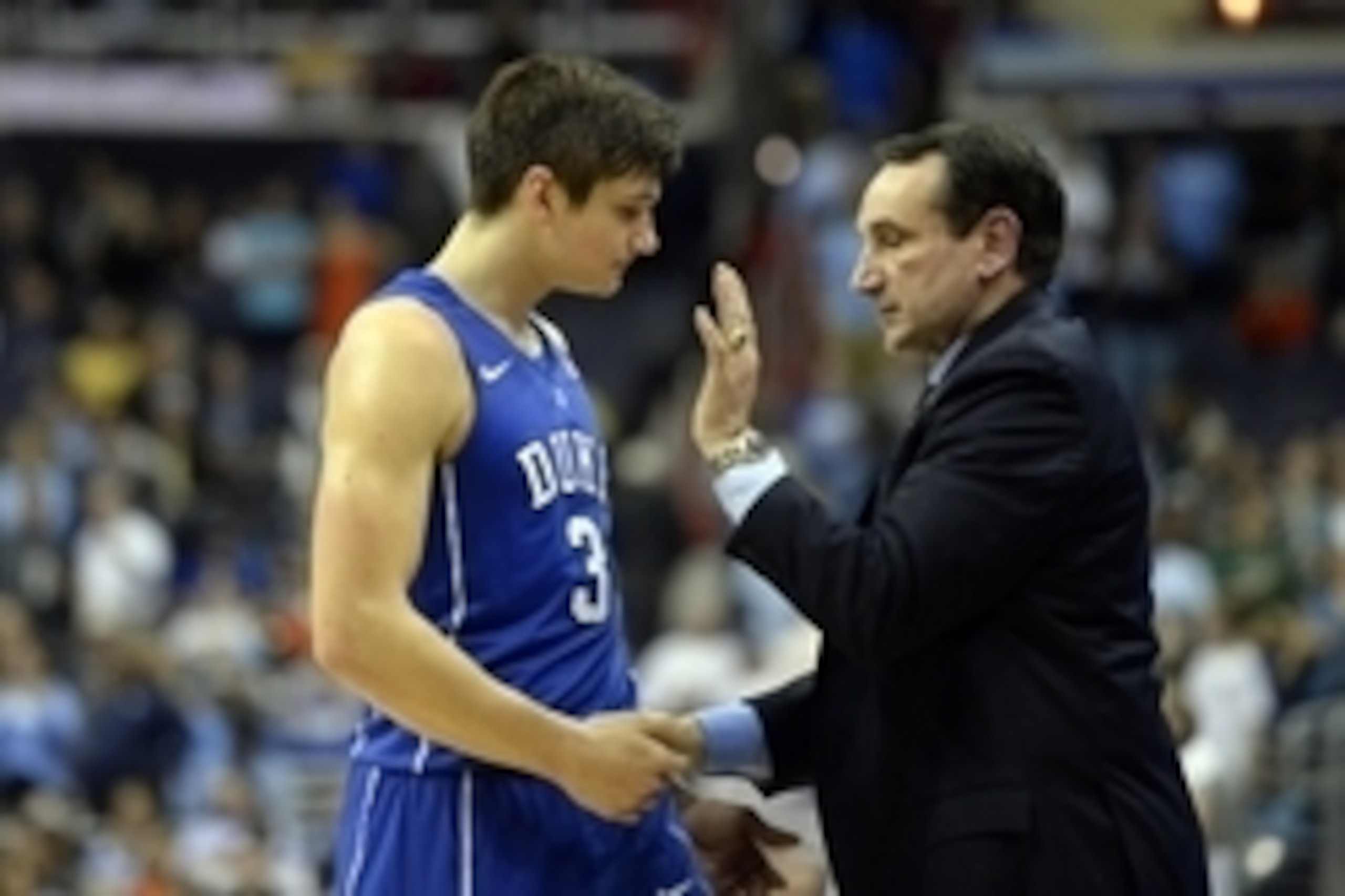 Mar 10, 2016; Washington, DC, USA; Duke Blue Devils head coach Mike Krzyzewski hugs guard Grayson Allen (3) after he fouled out in over time of during day three of the ACC conference tournament at Verizon Center. Notre Dame Fighting Irish defeated Duke Bl