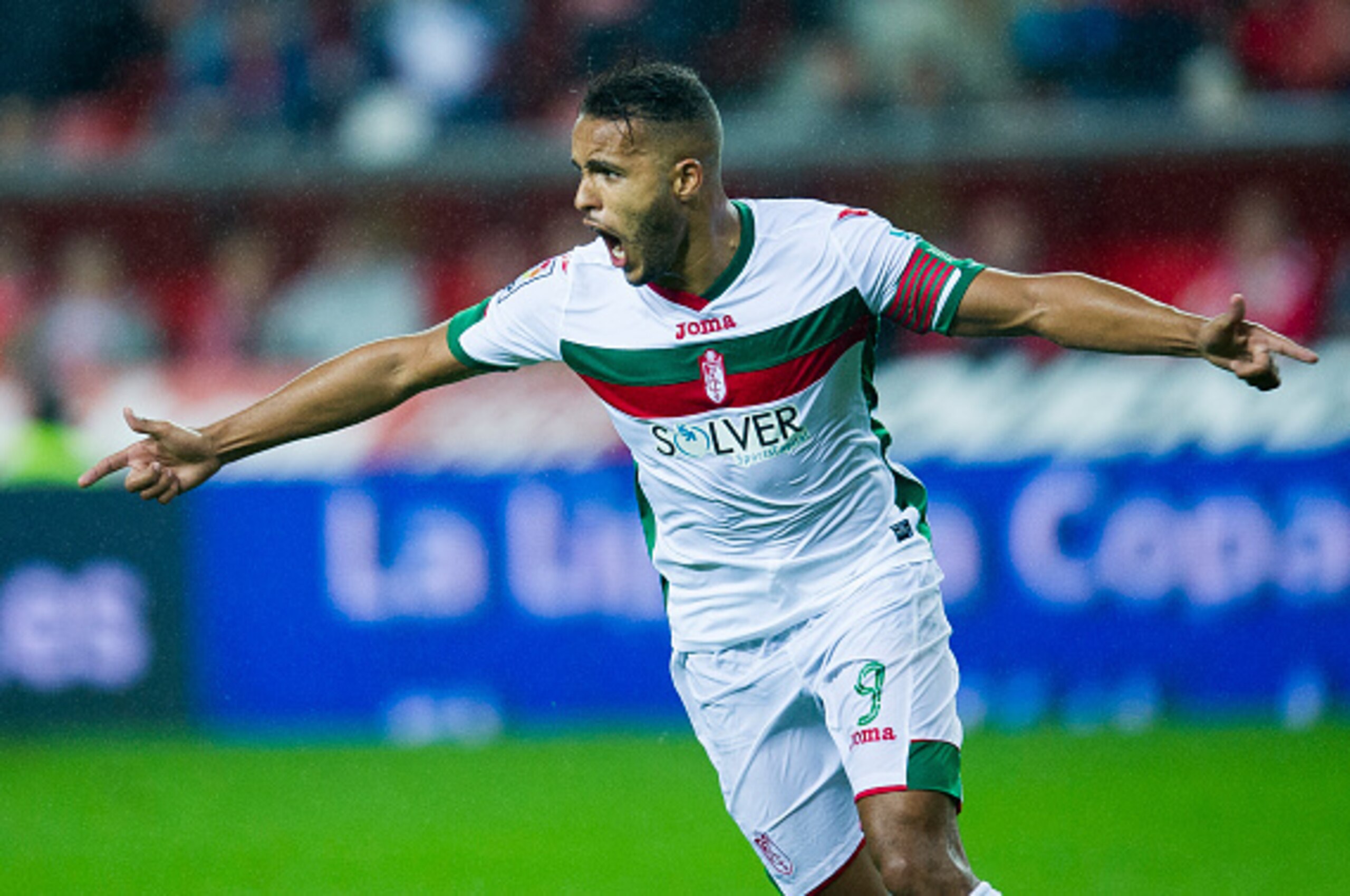 GIJON, SPAIN - OCTOBER 19: Youssef El Arabi of Granada CF celebrates after scoring during the La Liga match between Real Sporting de Gijon and Granada CF at Estadio El Molinon on October 19, 2015 in Gijon, Spain. (Photo by Juan Manuel Serrano Arce/Getty GIJON, SPAIN - OCTOBER 19: Youssef El Arabi of Granada CF celebrates after scoring during the La Liga match between Real Sporting de Gijon and Granada CF at Estadio El Molinon on October 19, 2015 in Gijon, Spain. (Photo by Juan Manuel Serrano Arce/Getty